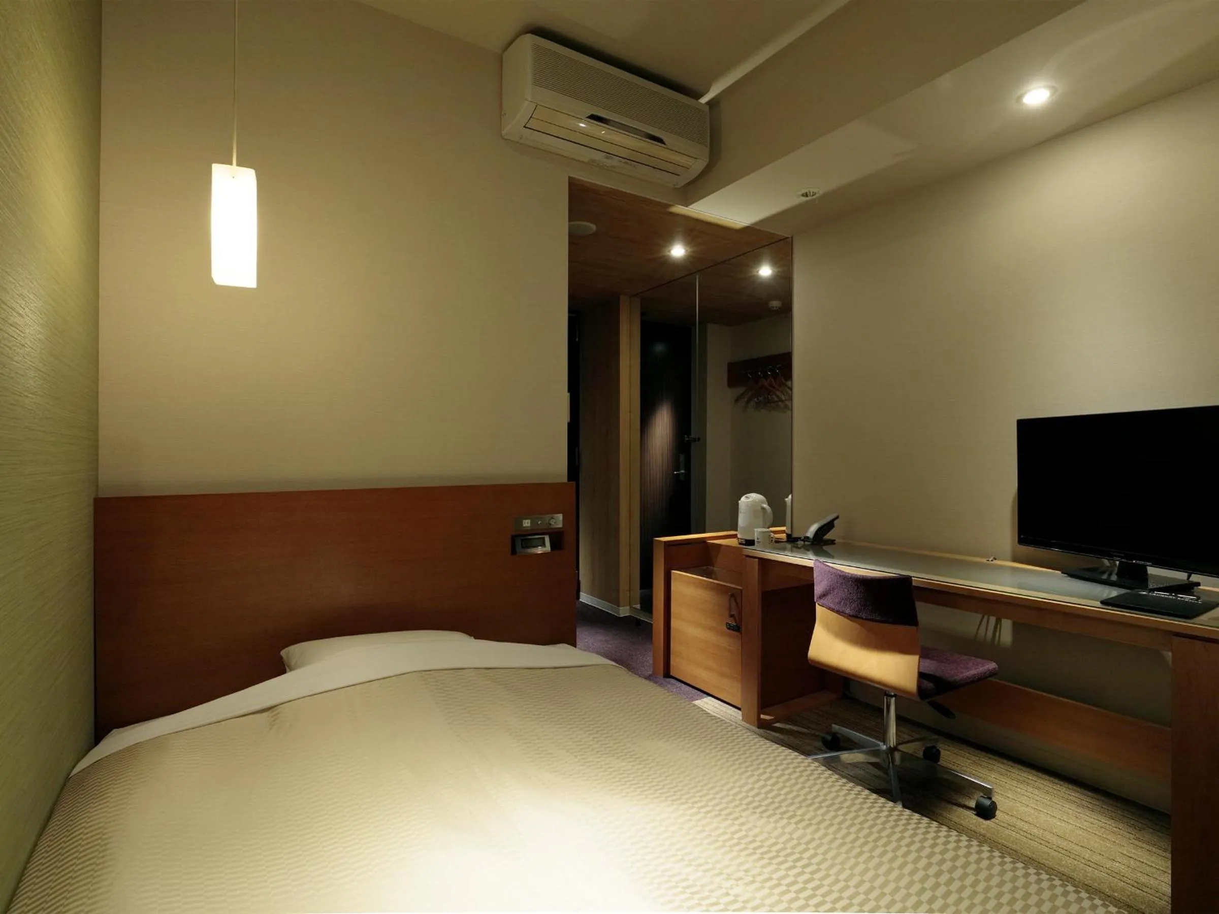 Bed in Candeo Hotels Chino