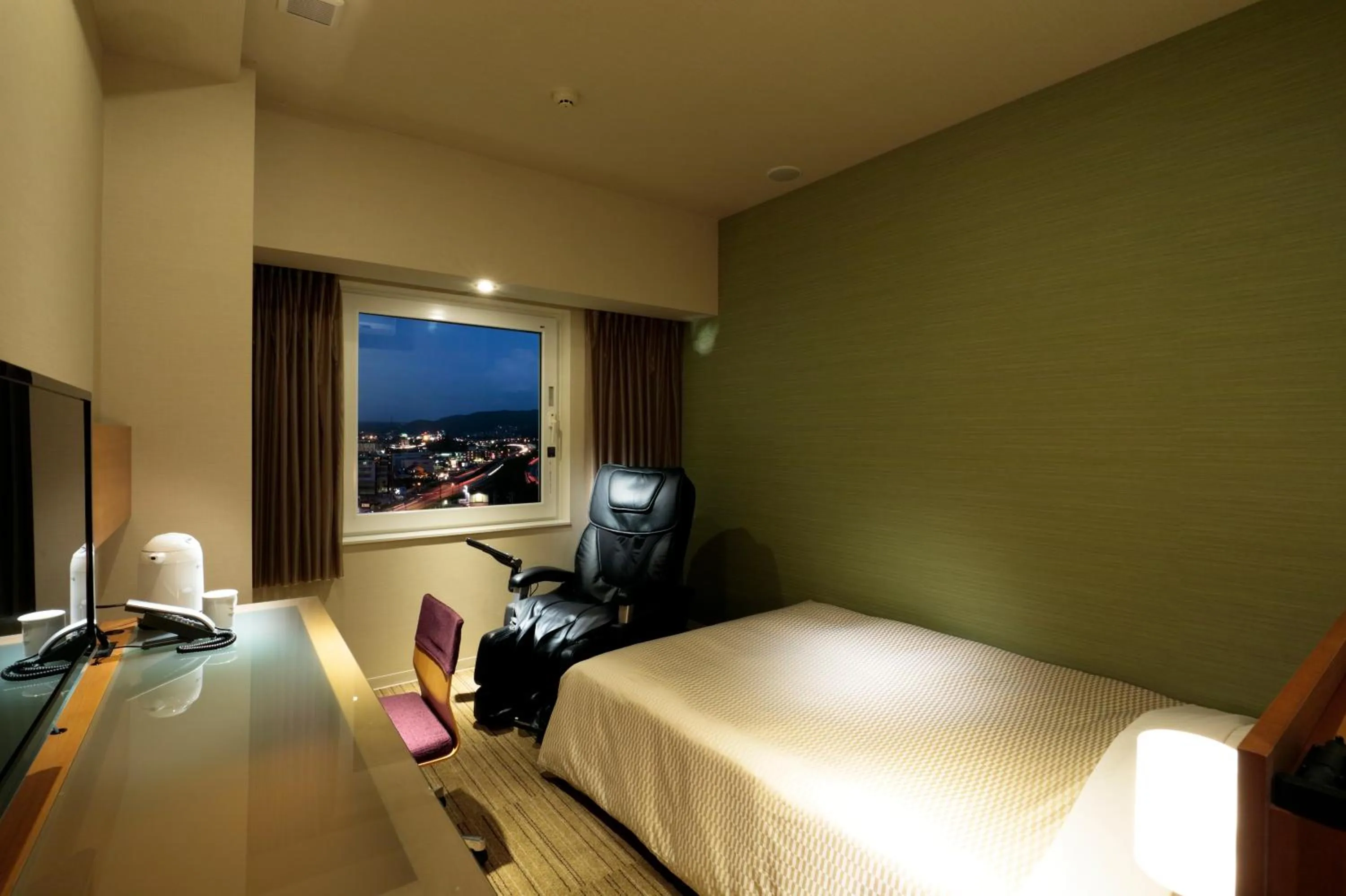 Bed in Candeo Hotels Chino