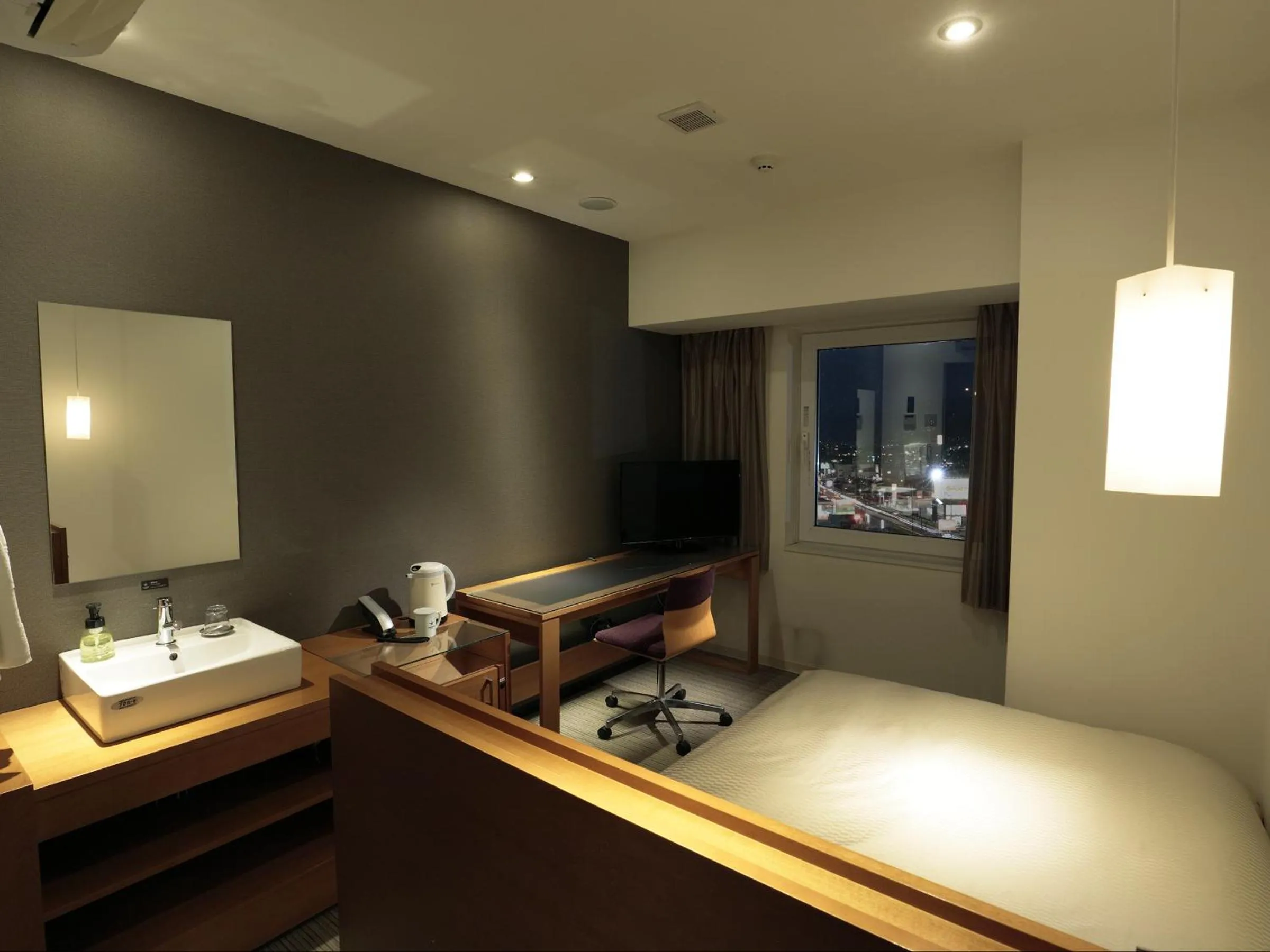 Bed in Candeo Hotels Chino