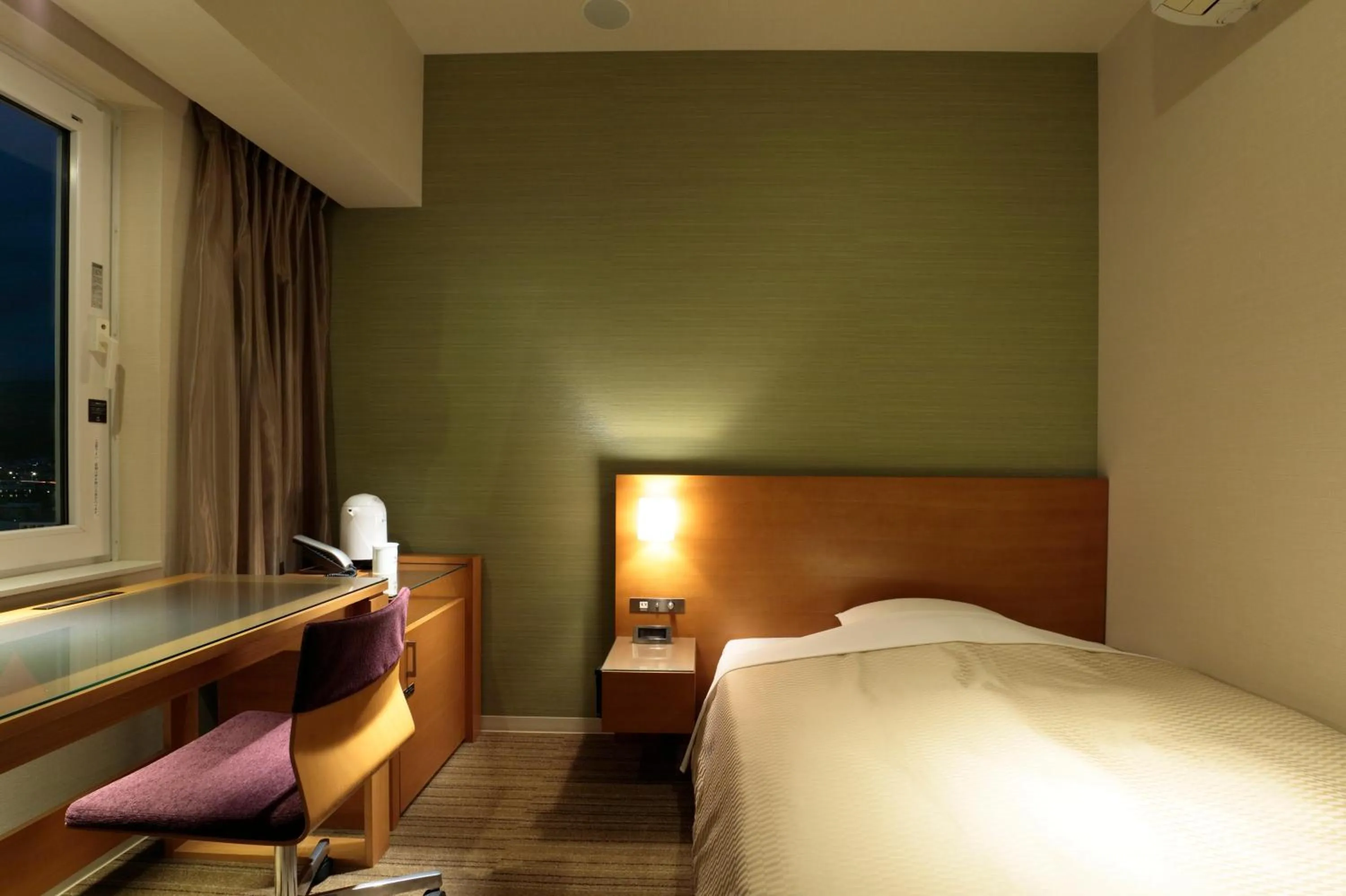 Bed in Candeo Hotels Chino