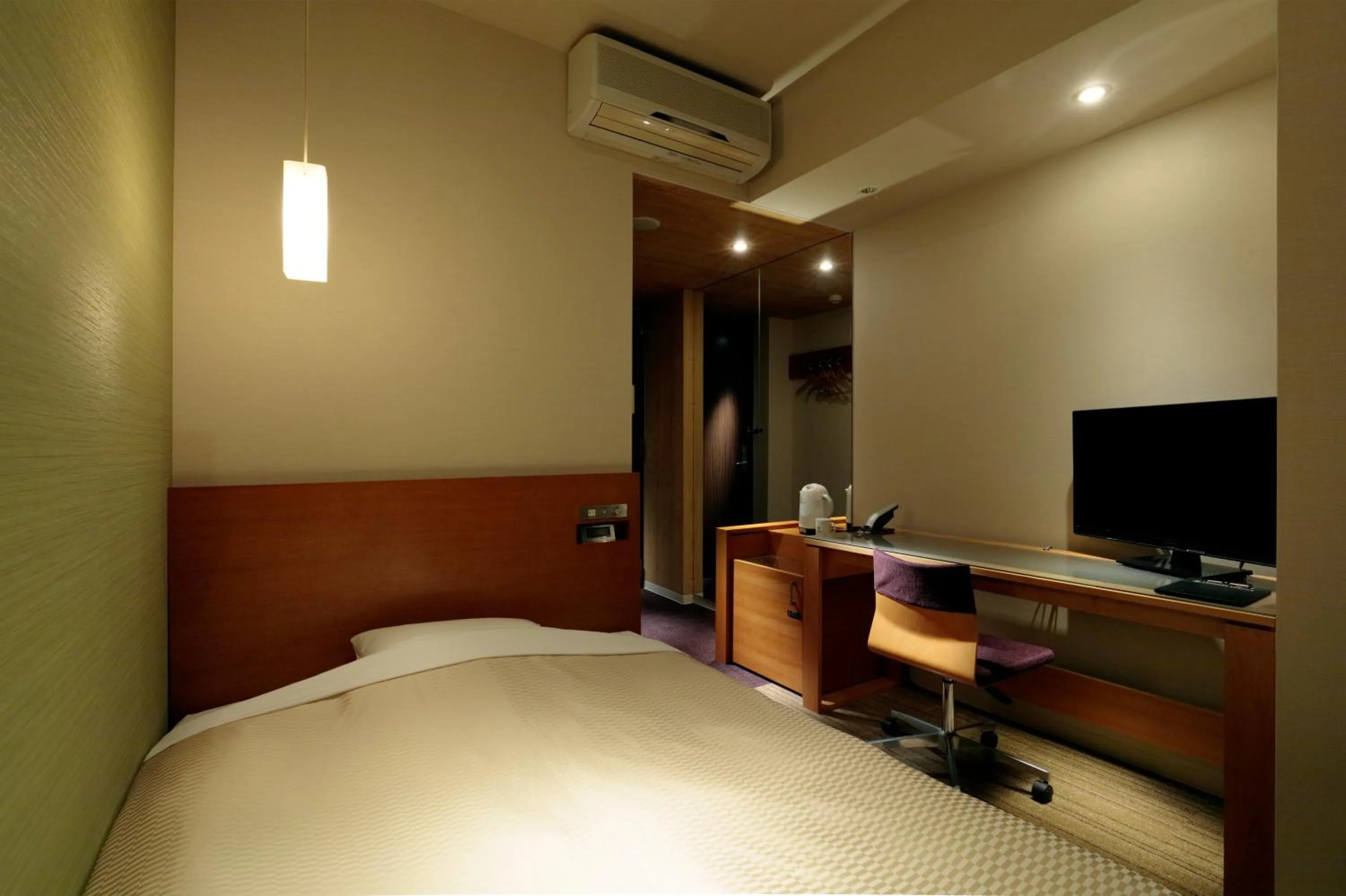 Bed in Candeo Hotels Chino