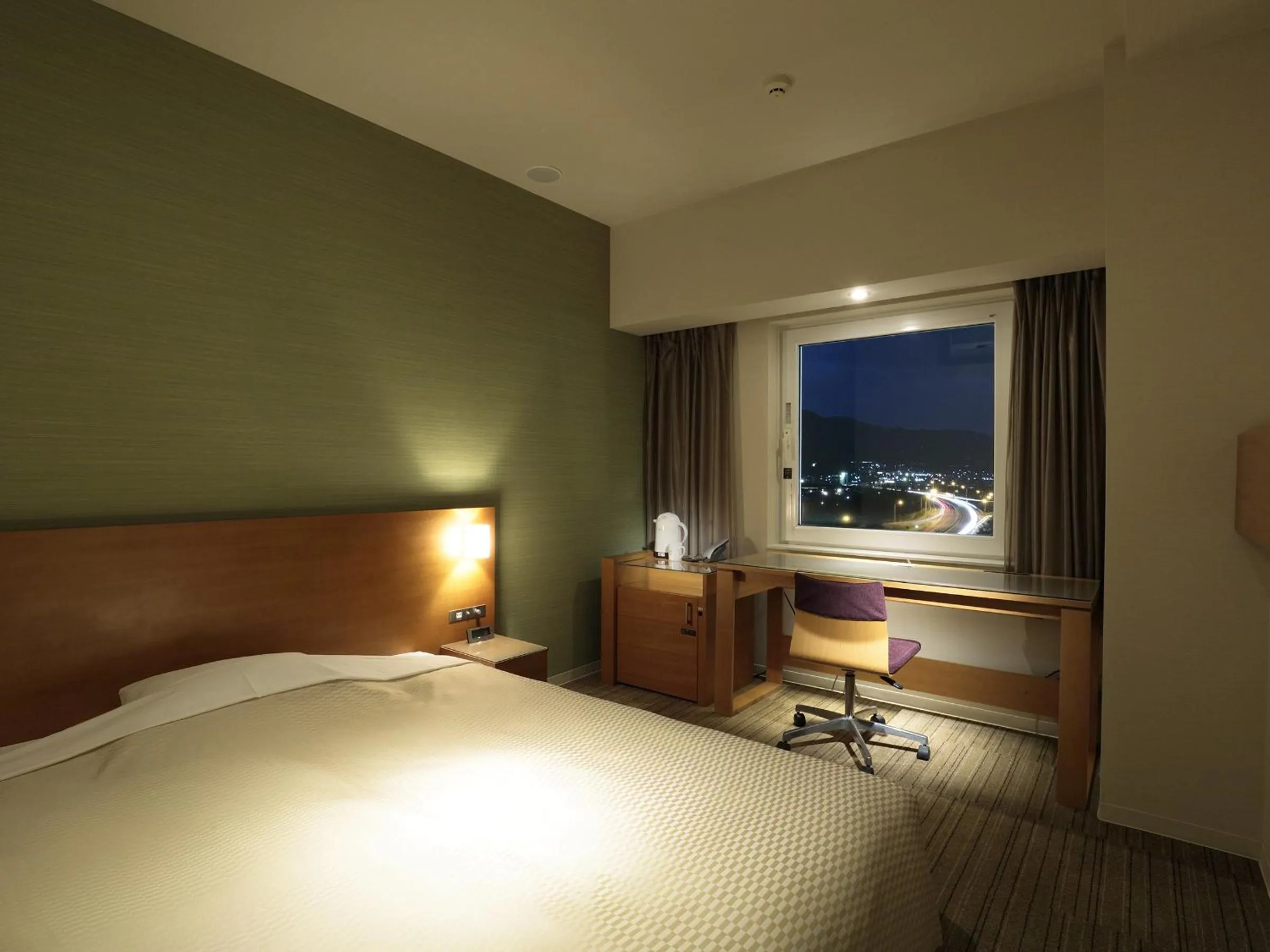 Bed in Candeo Hotels Chino