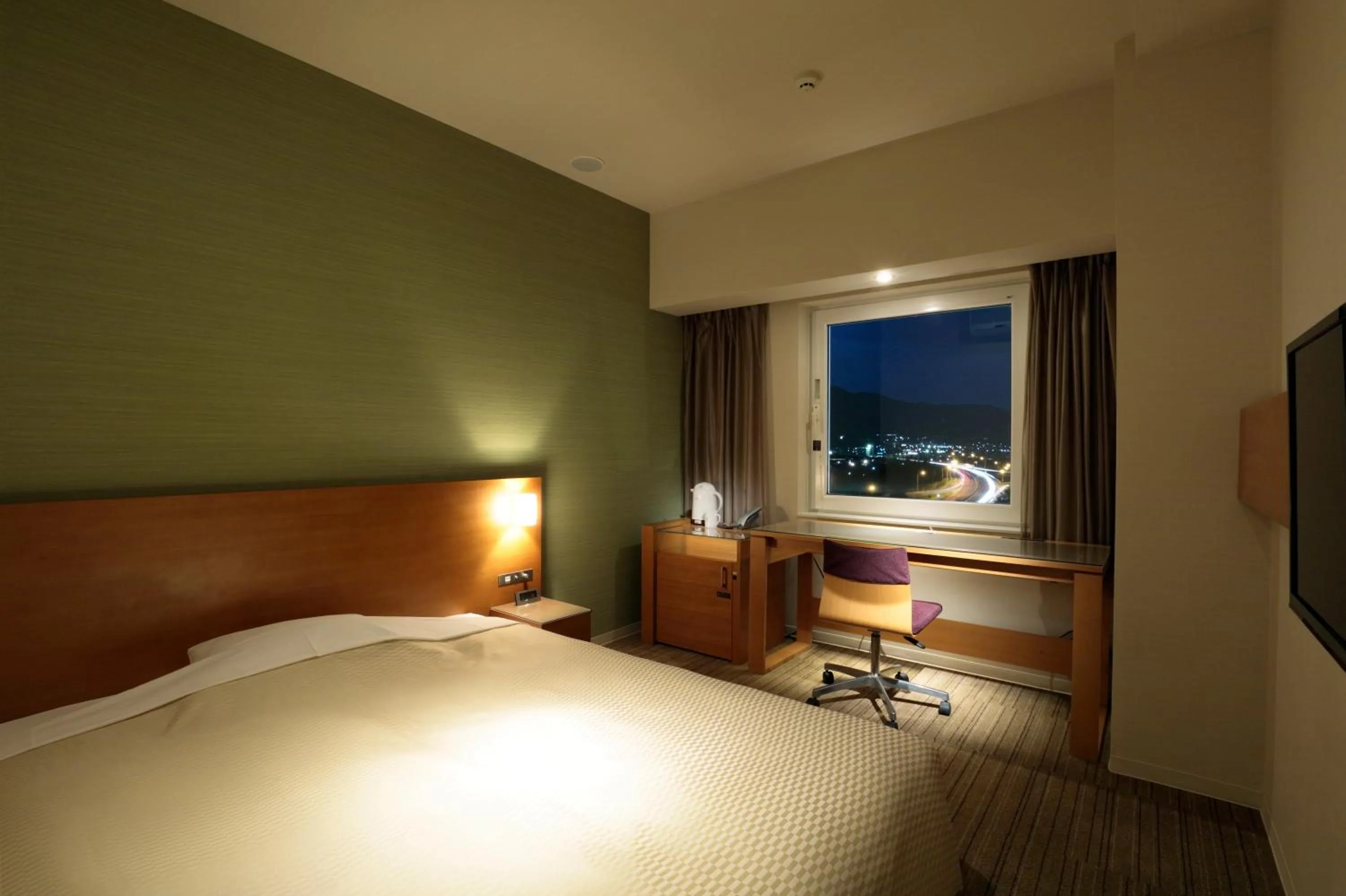 Bed in Candeo Hotels Chino