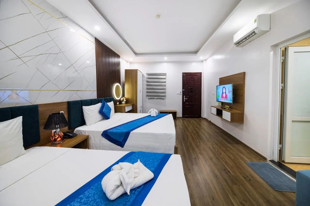 Bed in Aquarius Grand Hotel