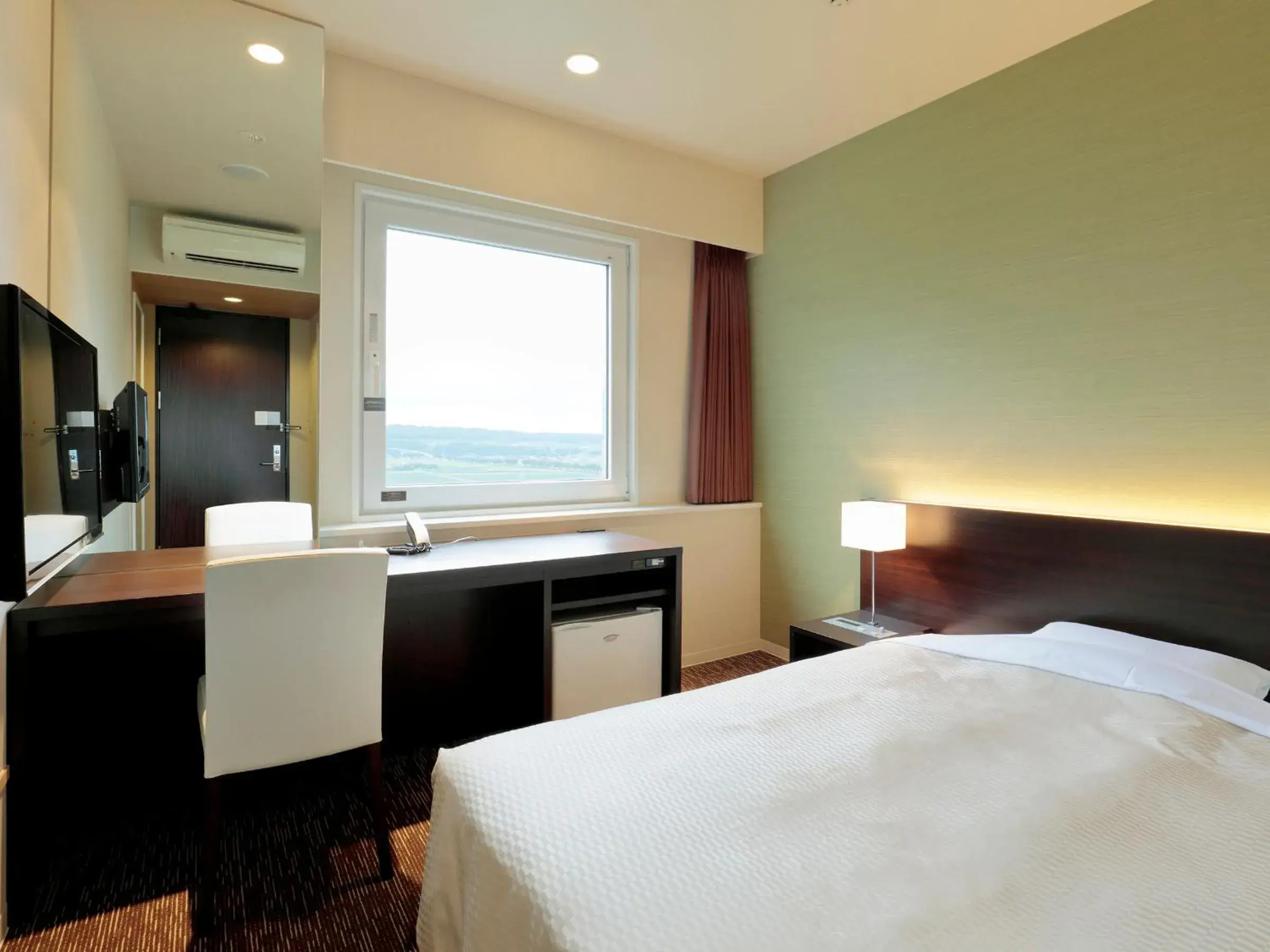 Bed in Candeo Hotels Ozu Kumamoto Airport Bed in Candeo Hotels Ozu Kumamoto Airport