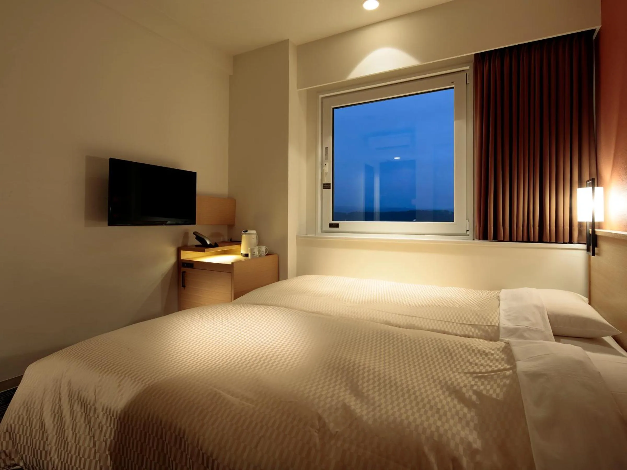 Bed in Candeo Hotels Ozu Kumamoto Airport