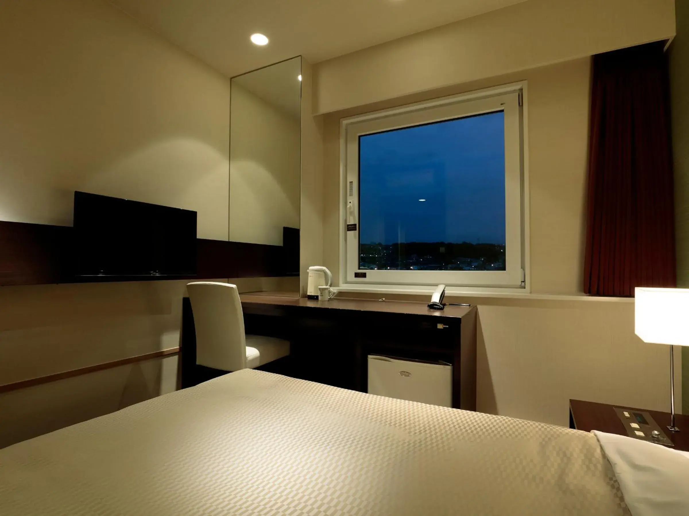 Bed in Candeo Hotels Ozu Kumamoto Airport Bed in Candeo Hotels Ozu Kumamoto Airport