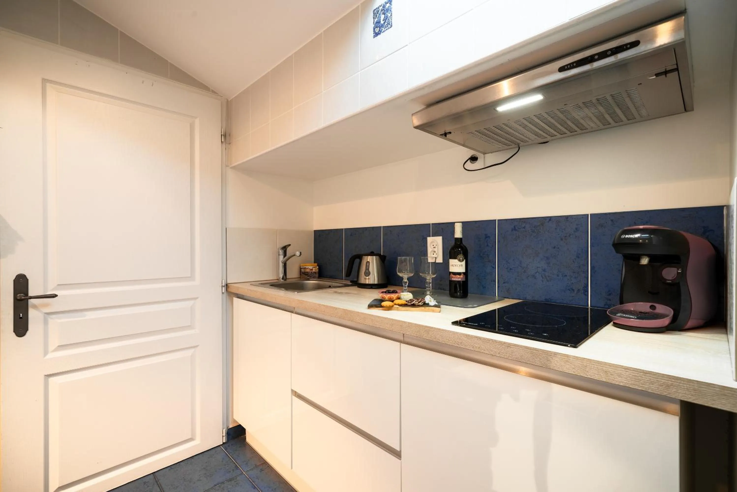 Kitchen or kitchenette in Villa Aimée Luxury Apartments with Heated Pool