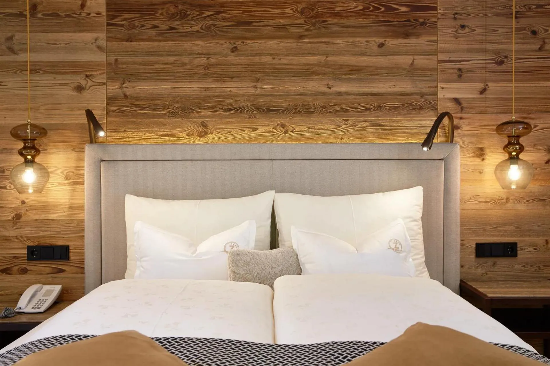 Bed in ZillergrundRock Luxury Mountain Resort