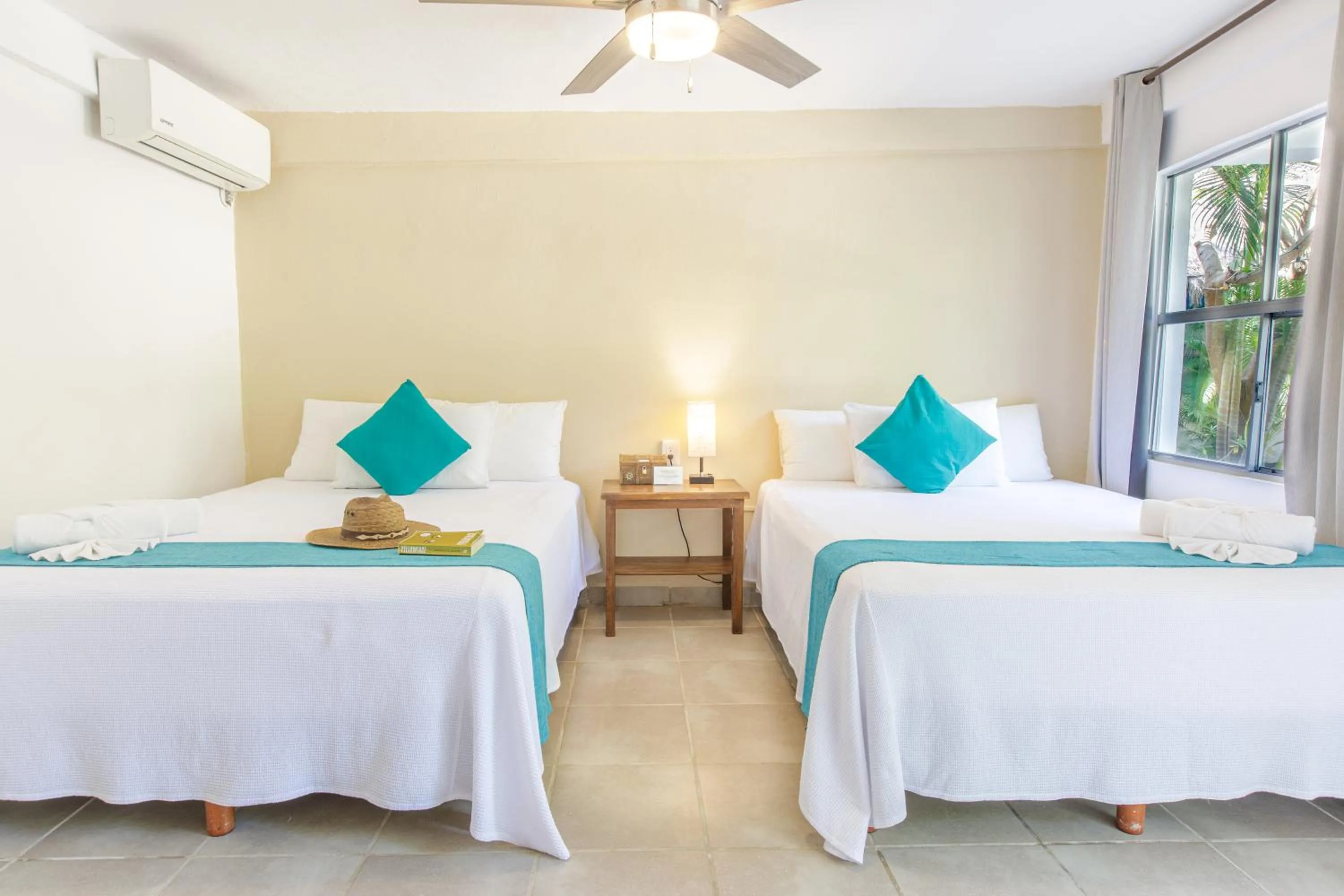 Bed in La Diosa Kali Beach Front Hotel