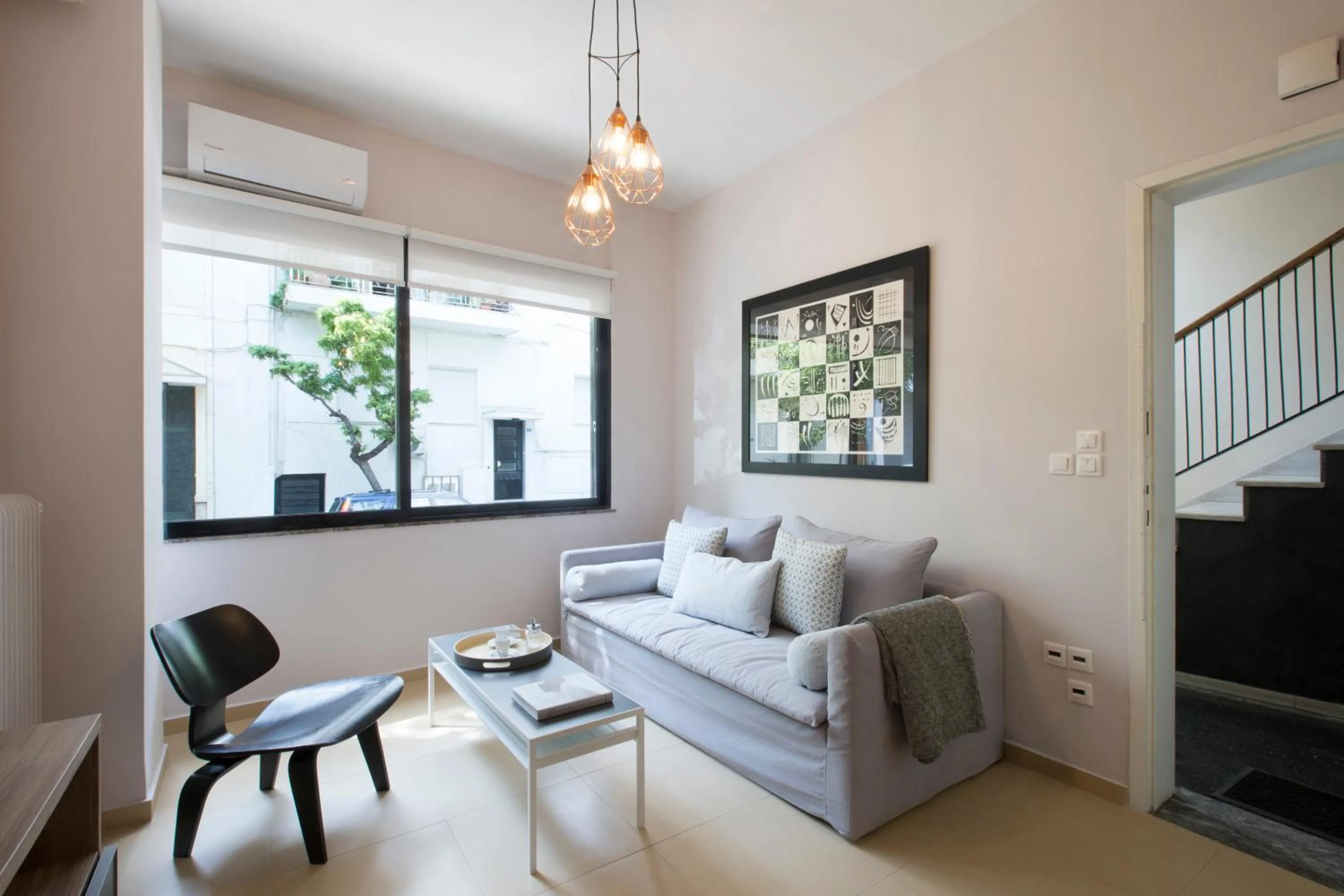 Living room in Under the shade of Acropolis by YHA