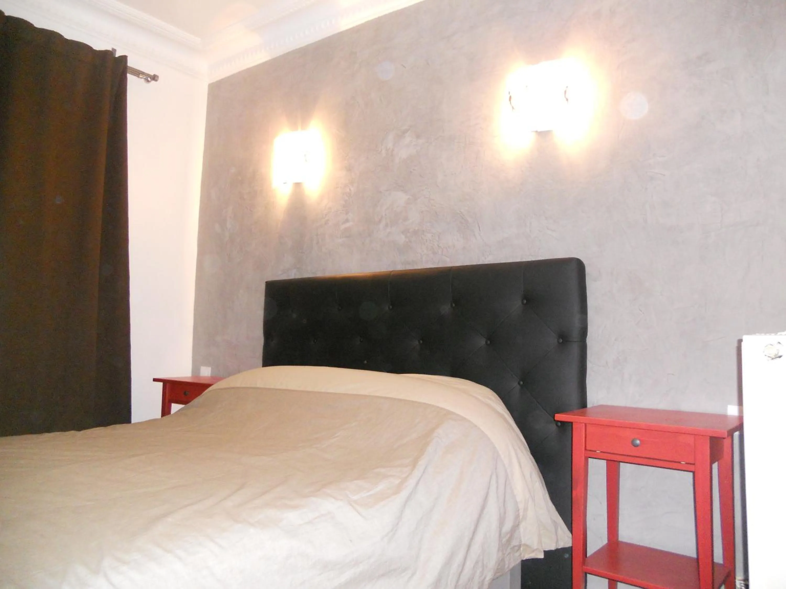 Bed in Hotel Pacific