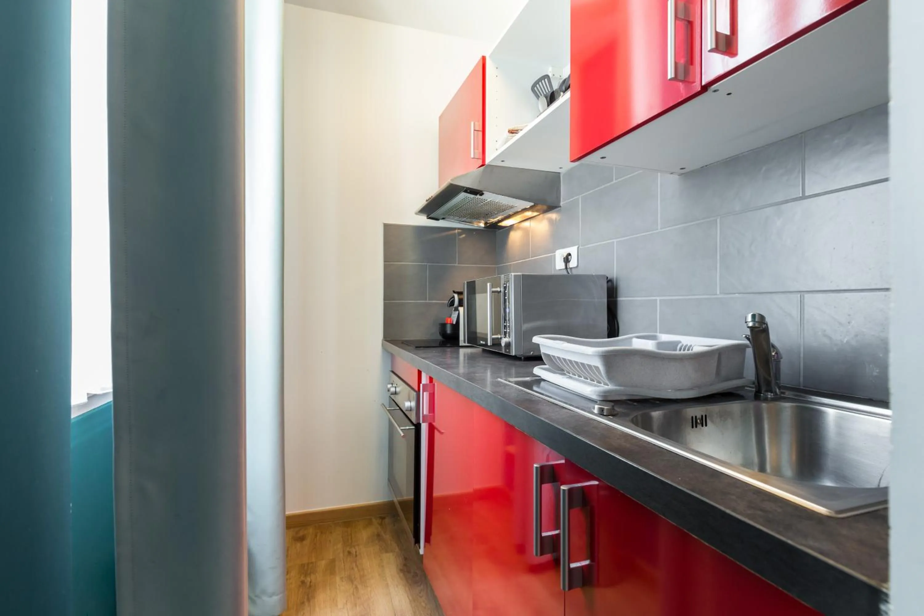 Kitchen or kitchenette in Florella Clemenceau Apartment