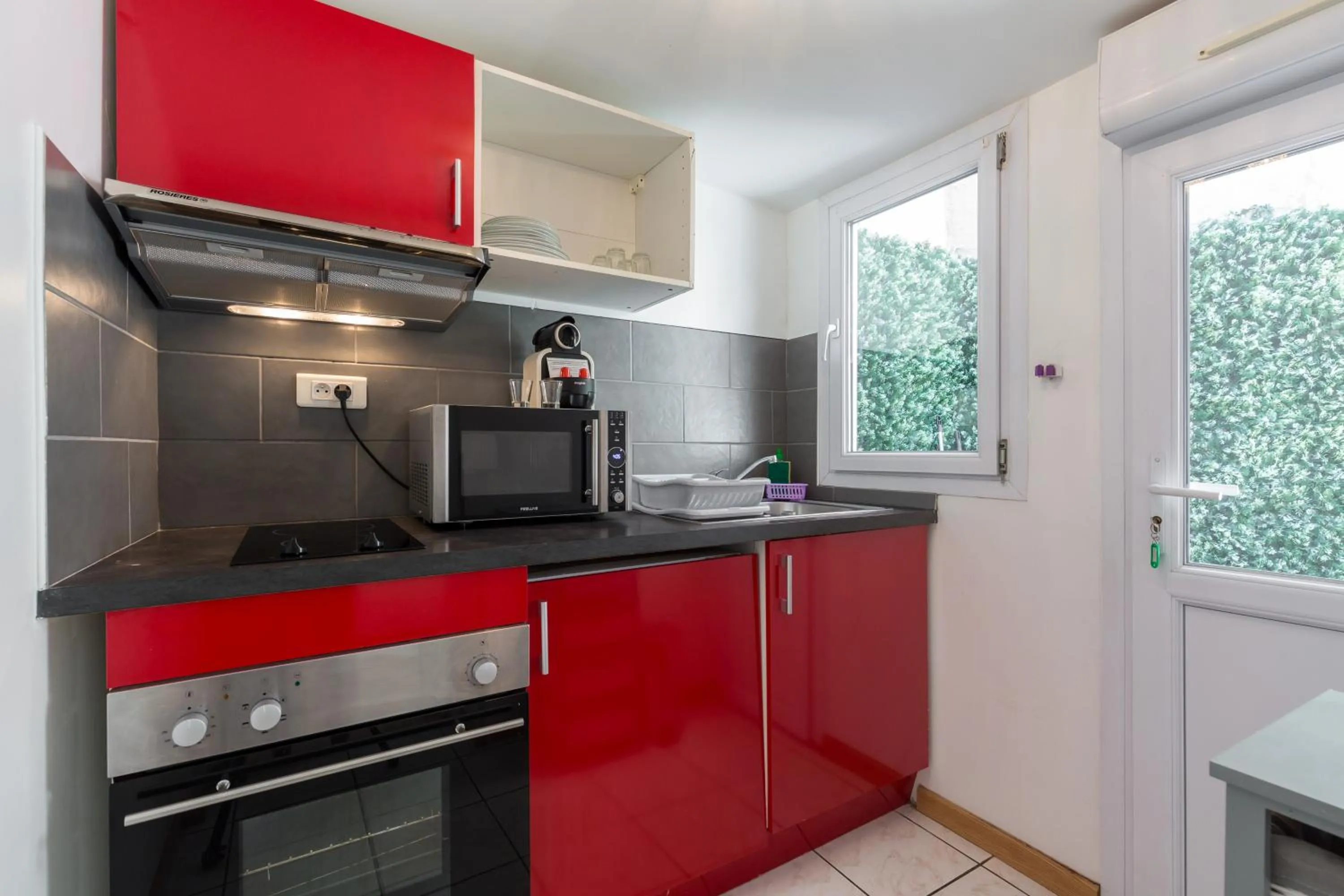 Kitchen or kitchenette in Florella Clemenceau Apartment