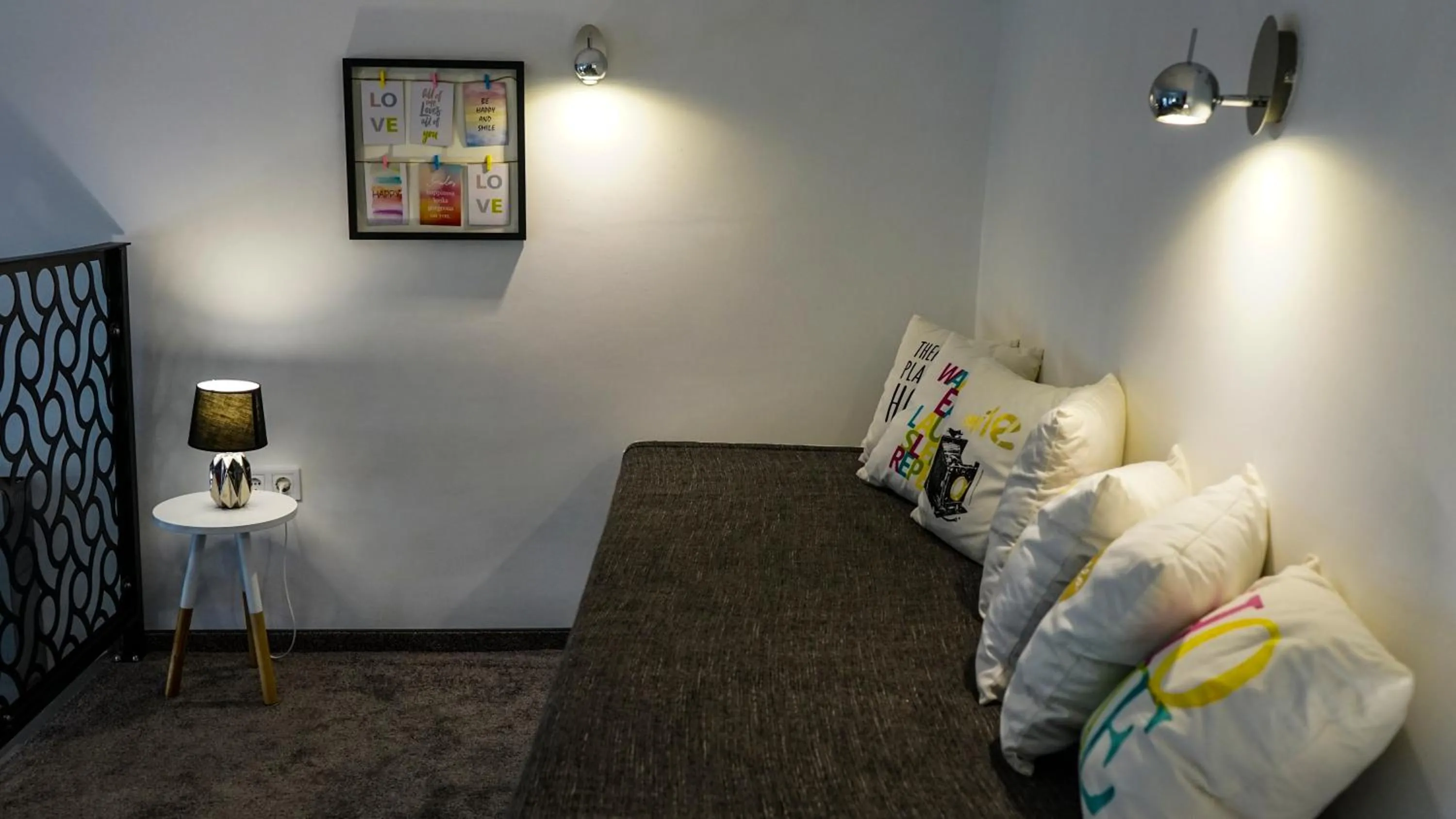 Bed in DownTown DeLuxe Apartment