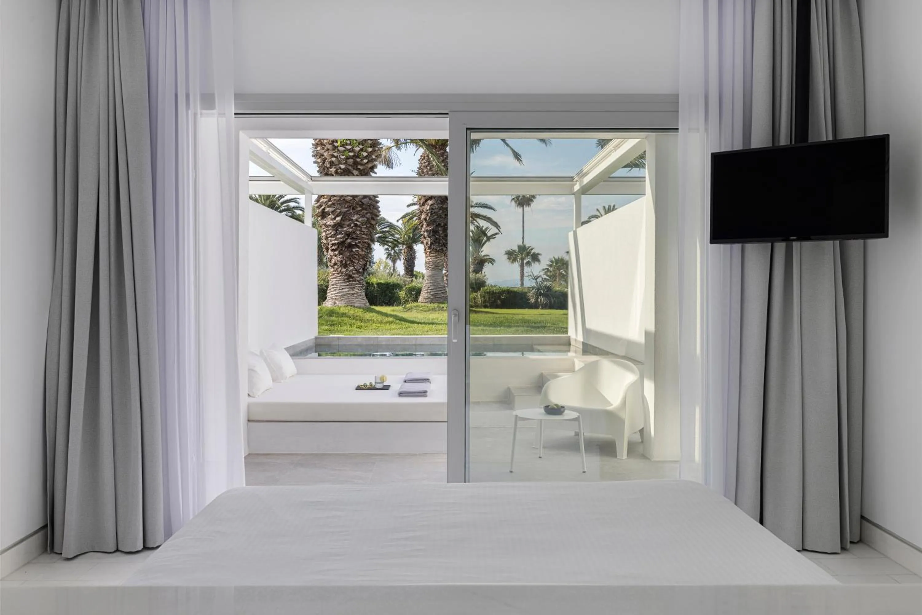 Bed in Kassandra Palace Seaside Resort