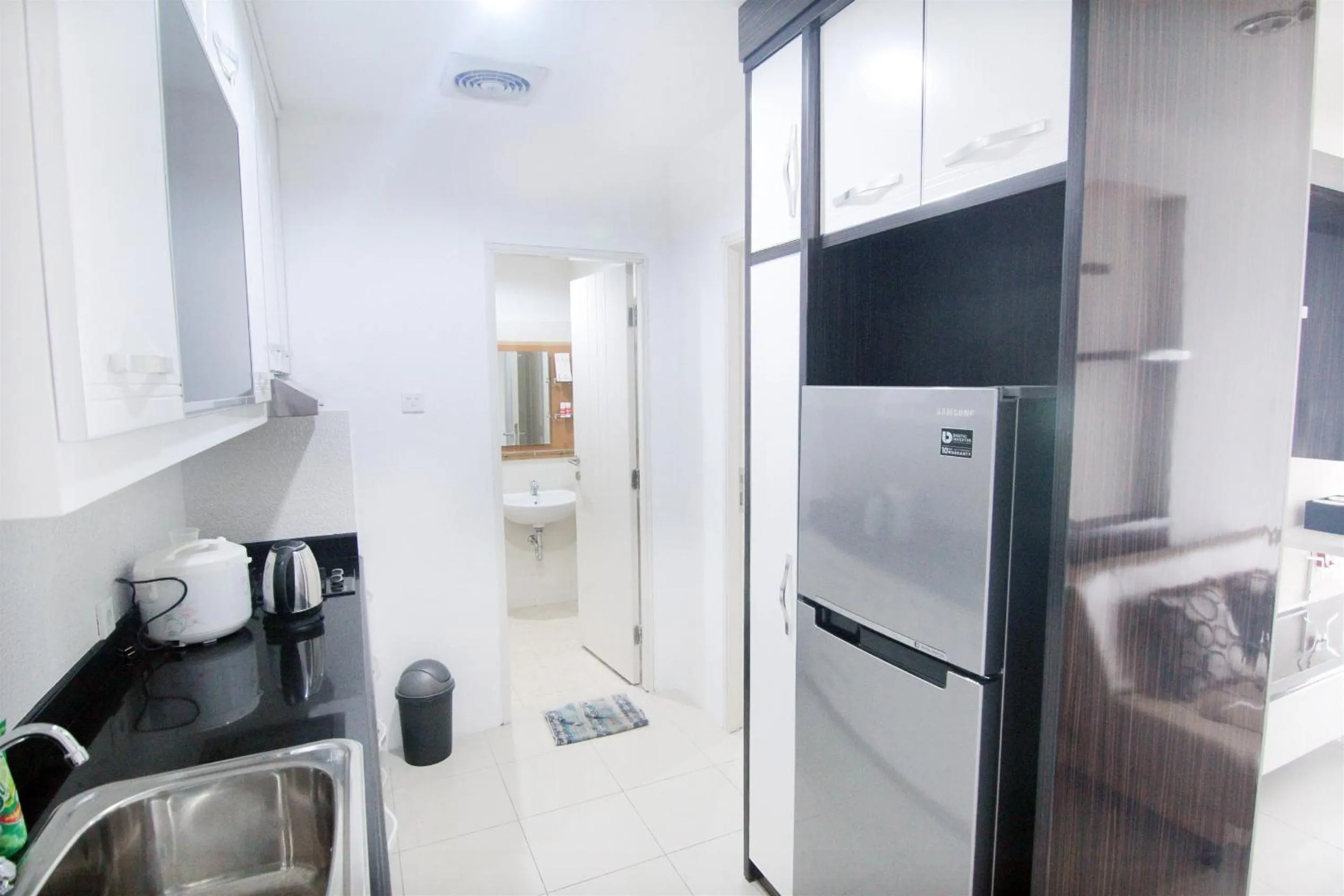 Kitchen or kitchenette in 2BR Cervino Village Casablanca Apartment near Kota Kasablanka By Travelio