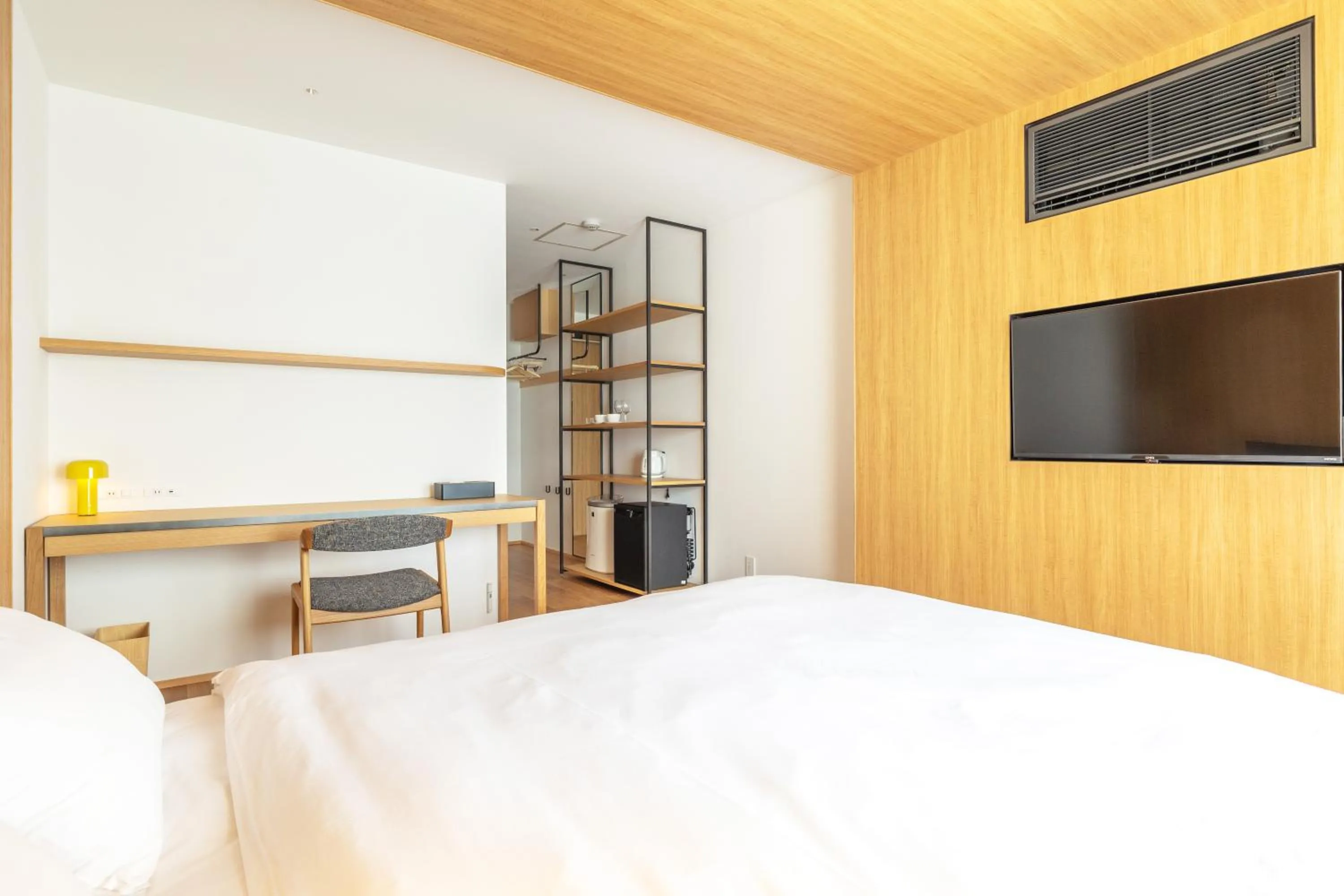 Bed in Karasuma Rokujo Hotel