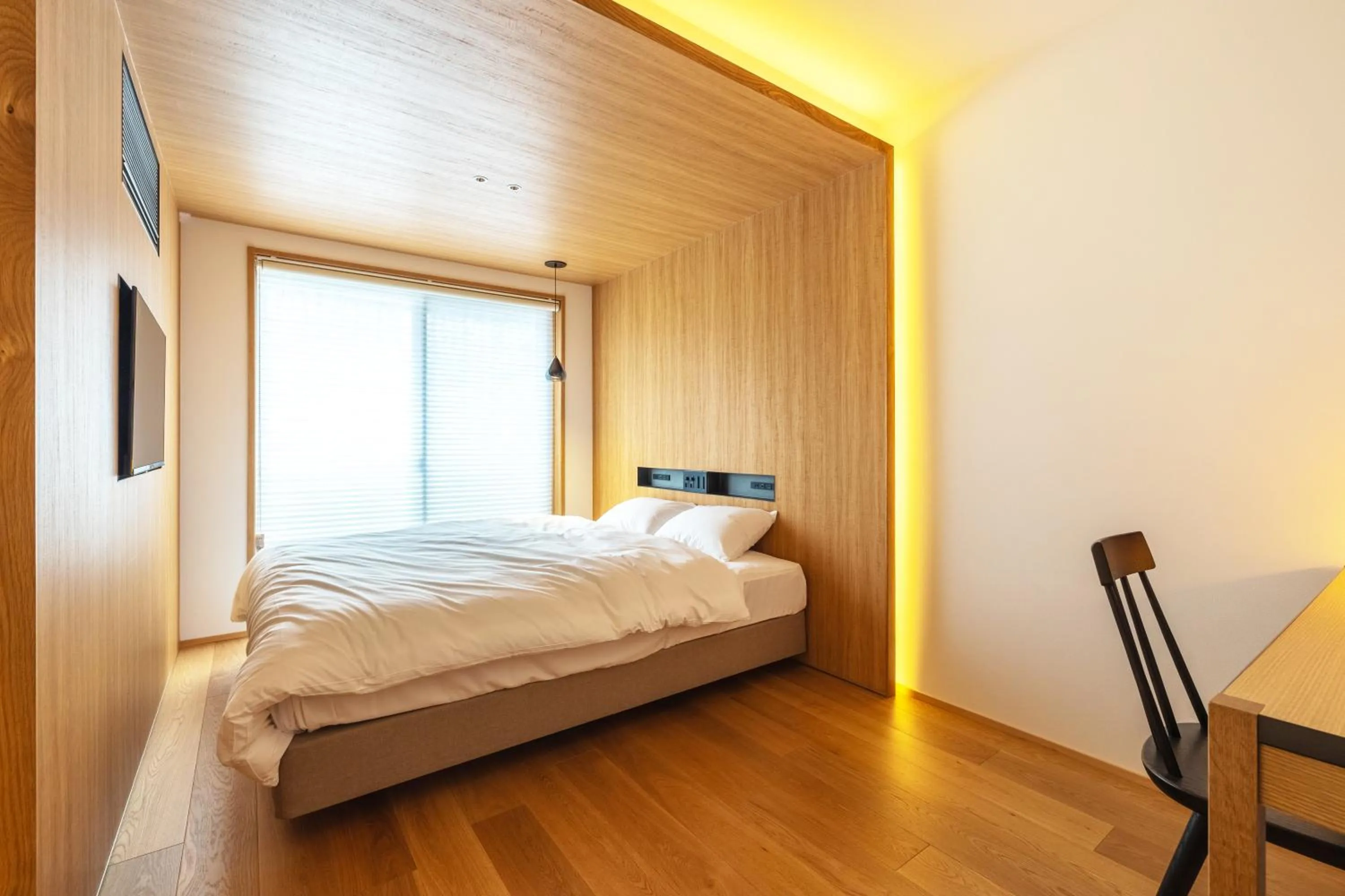 Bed in Karasuma Rokujo Hotel