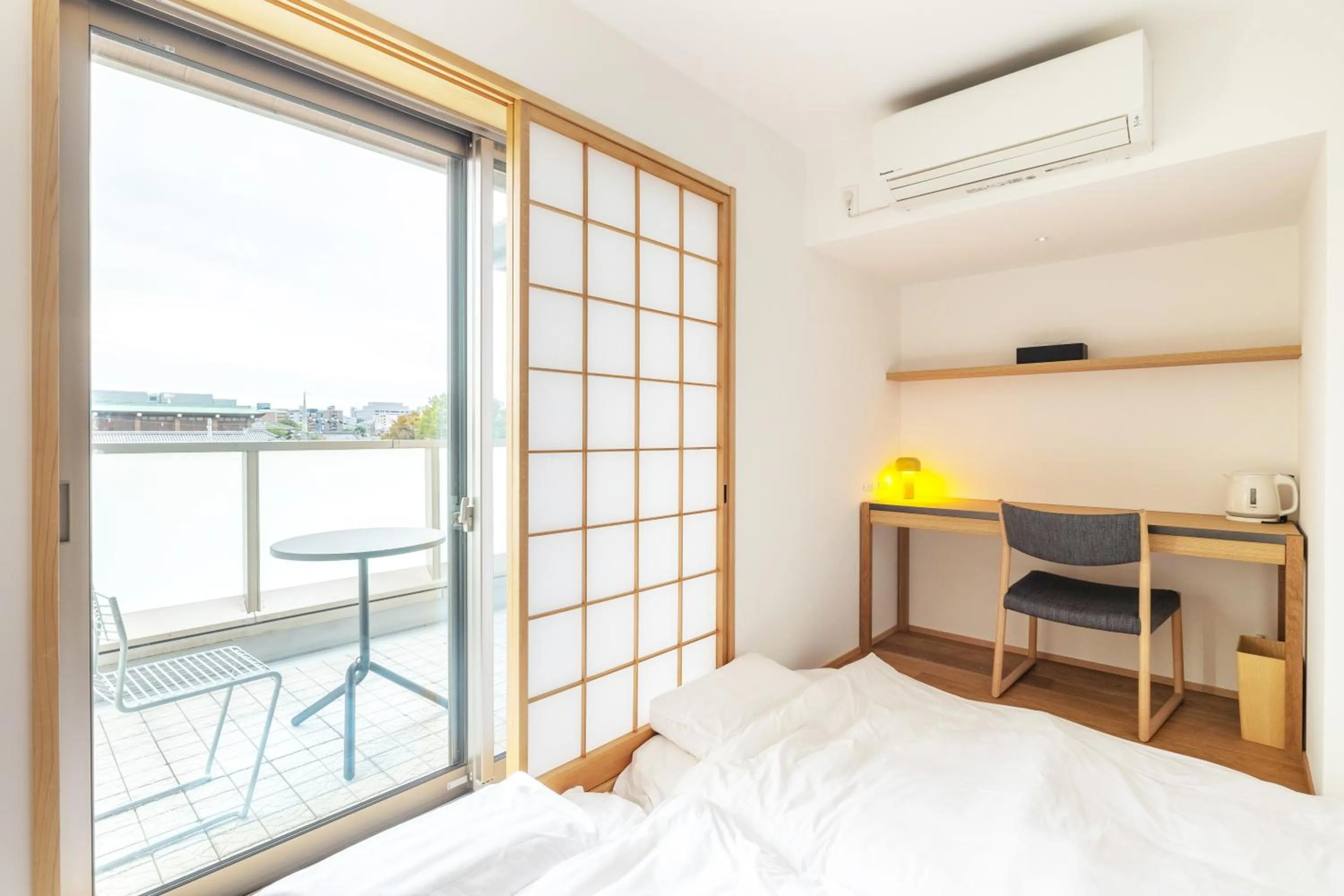 Bed in Karasuma Rokujo Hotel