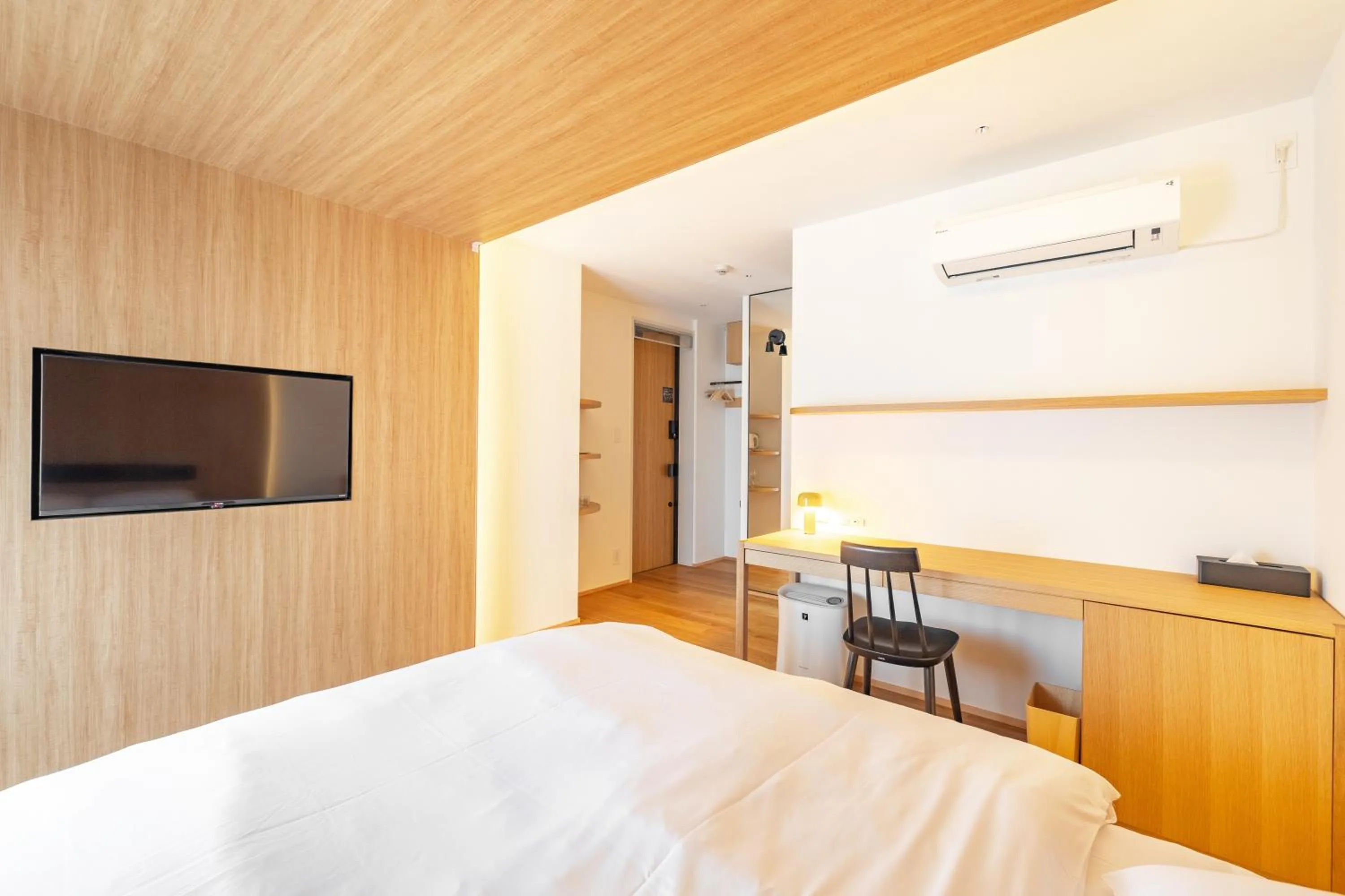 Bed in Karasuma Rokujo Hotel