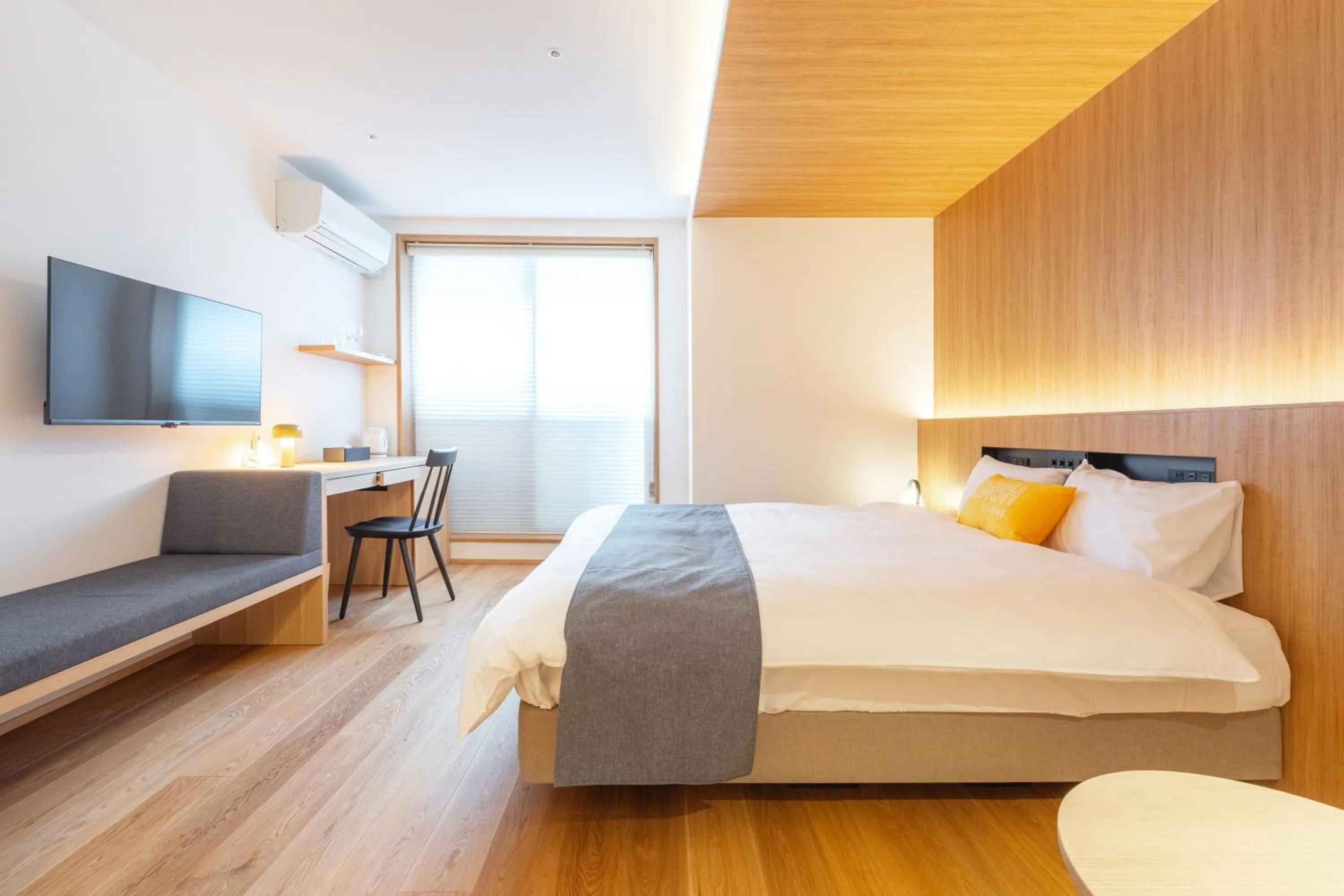 Bed in Karasuma Rokujo Hotel