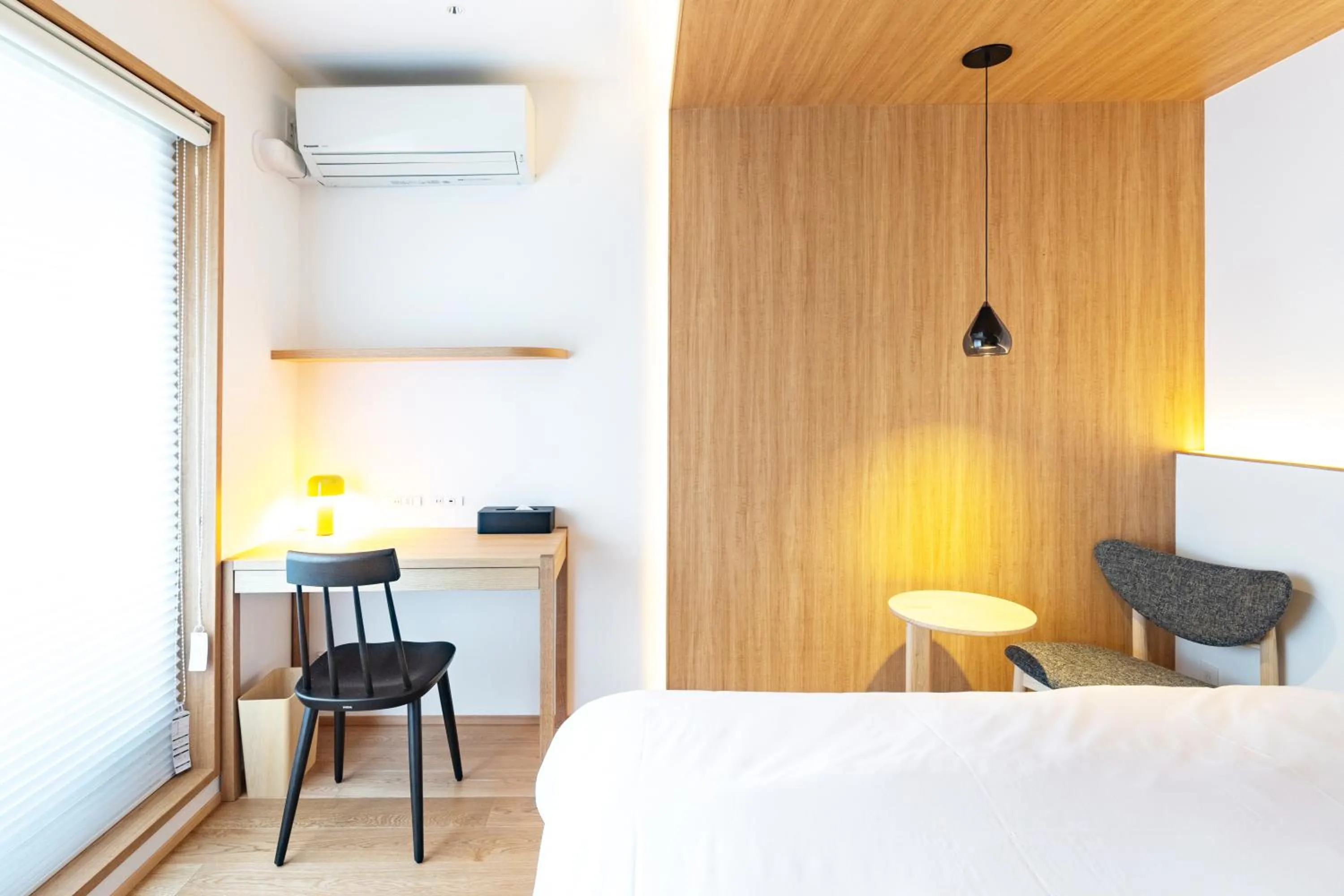 Bed in Karasuma Rokujo Hotel