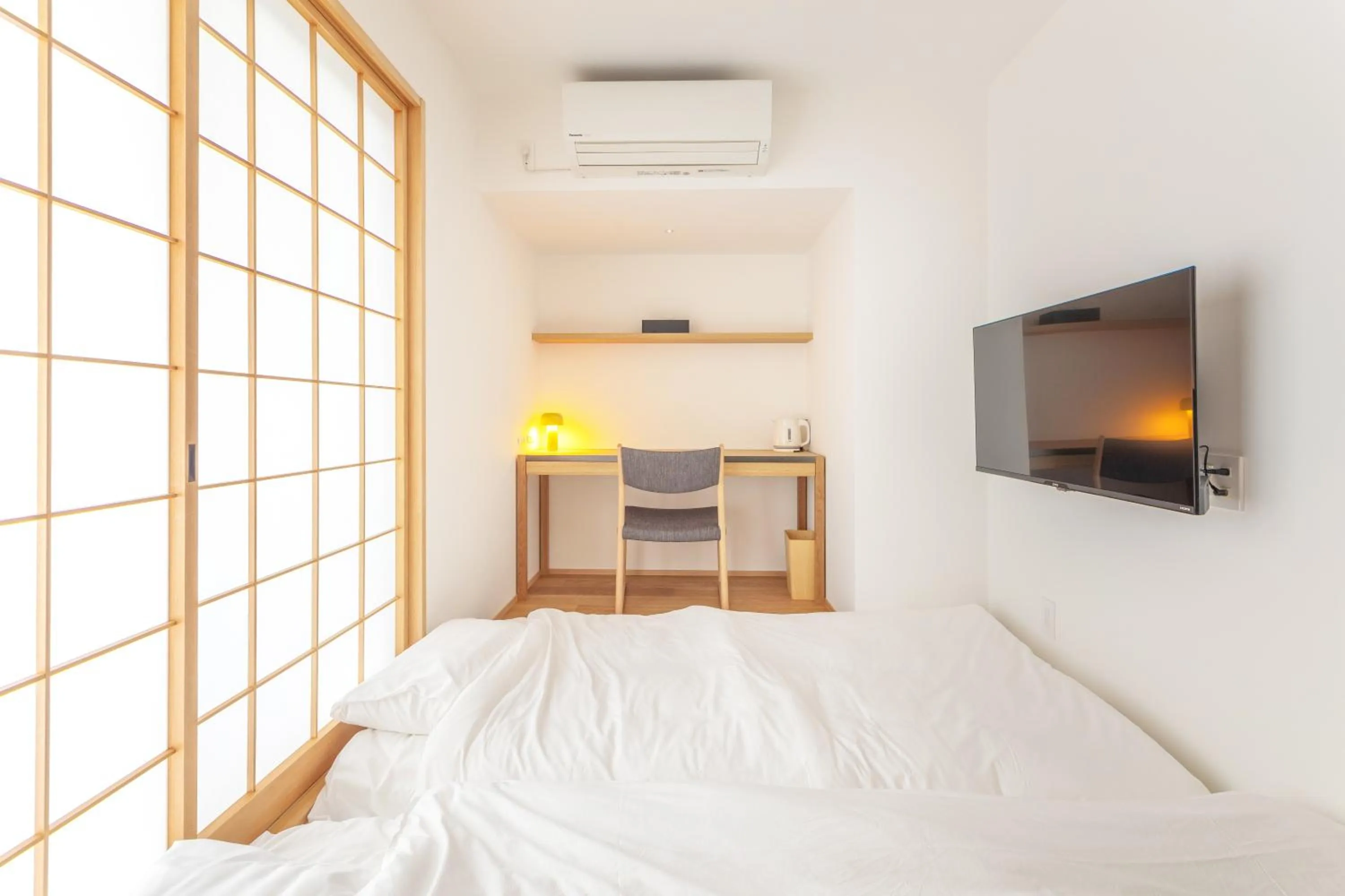 Bed in Karasuma Rokujo Hotel