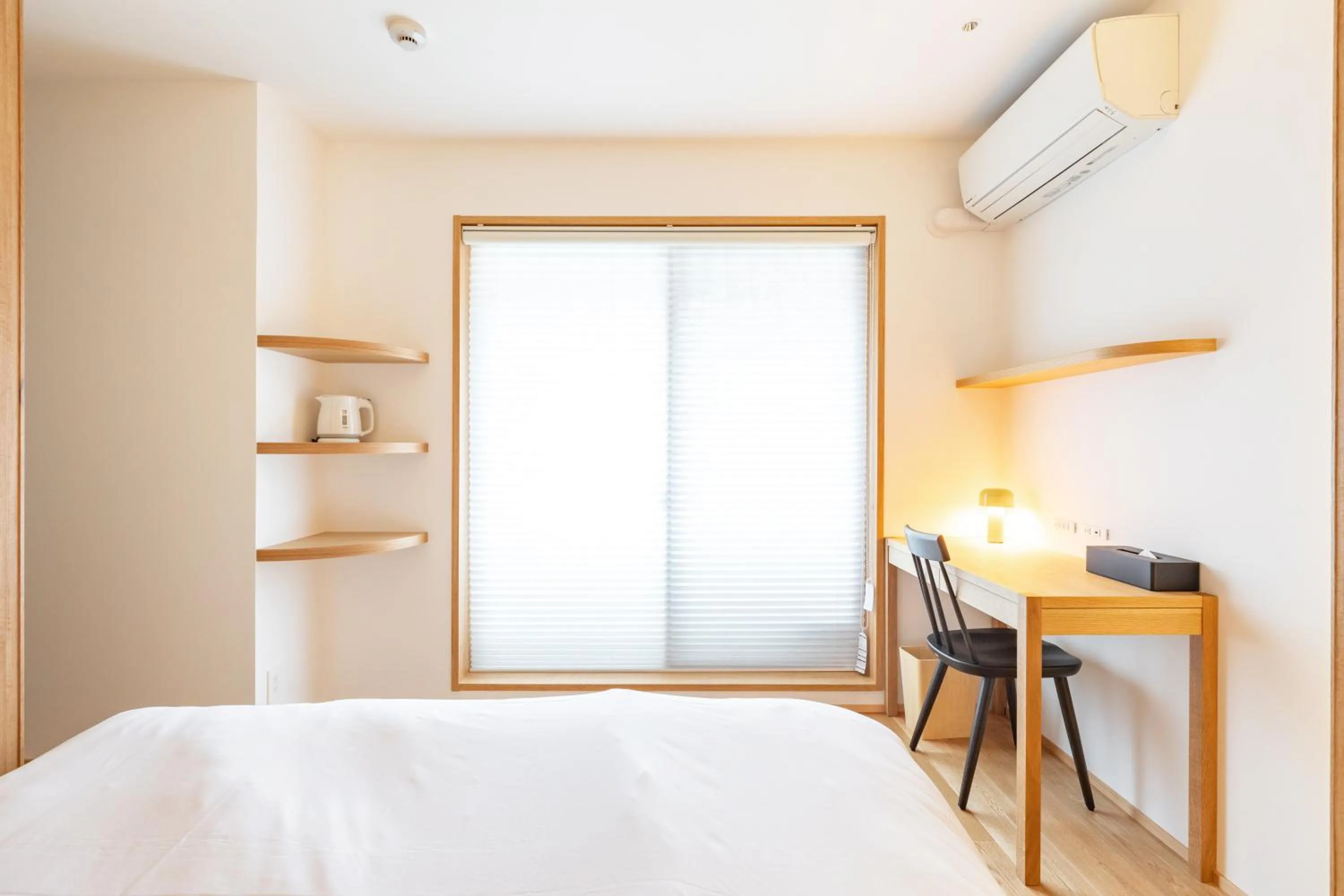 Bed in Karasuma Rokujo Hotel