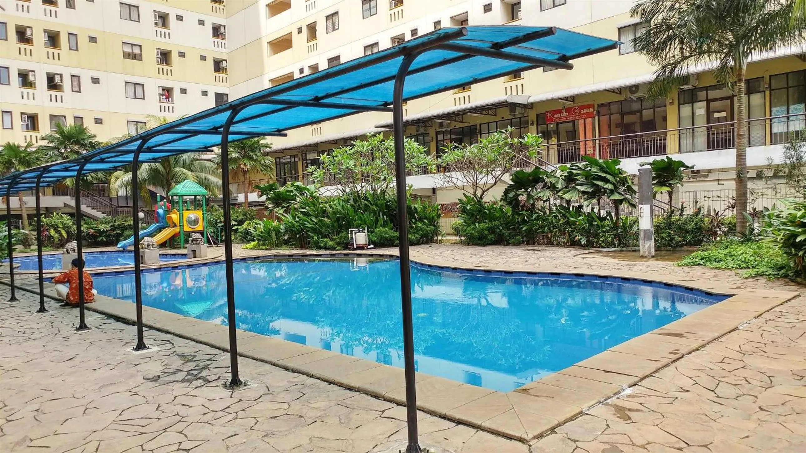 Swimming pool in Kebagusan City Apartment Simple And Affordable Studio By Travelio