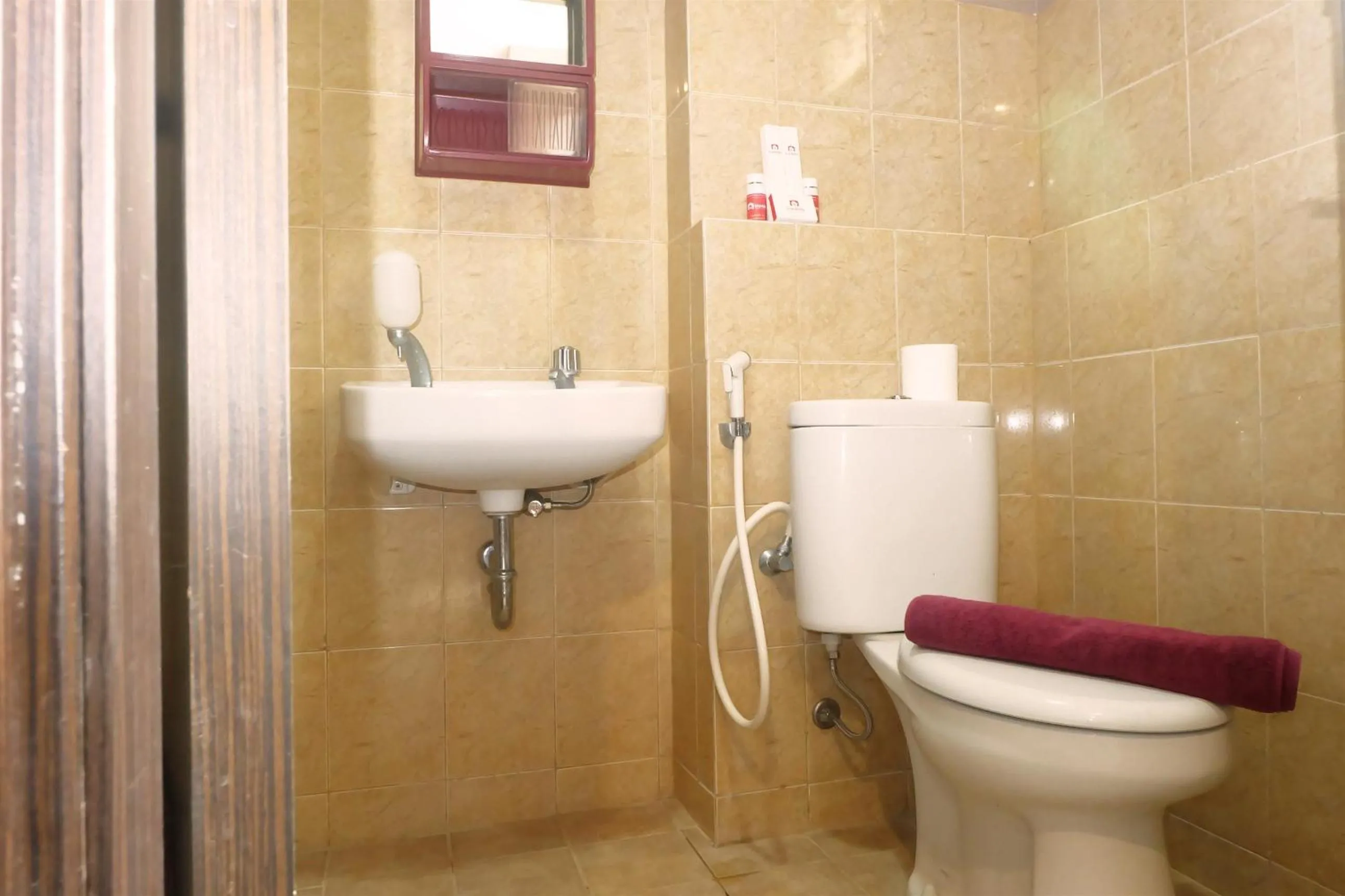 Bathroom in Kebagusan City Apartment Simple And Affordable Studio By Travelio
