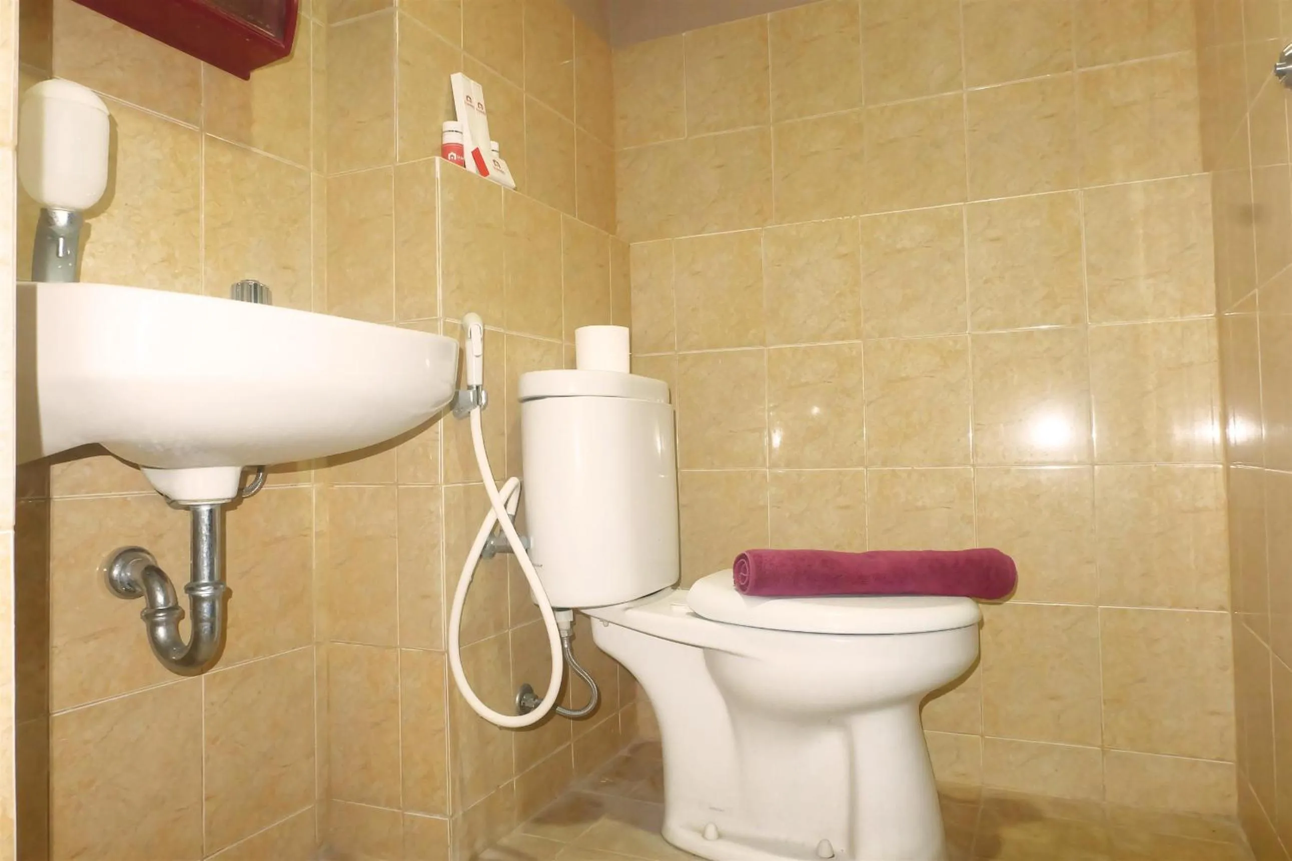 Bathroom in Kebagusan City Apartment Simple And Affordable Studio By Travelio