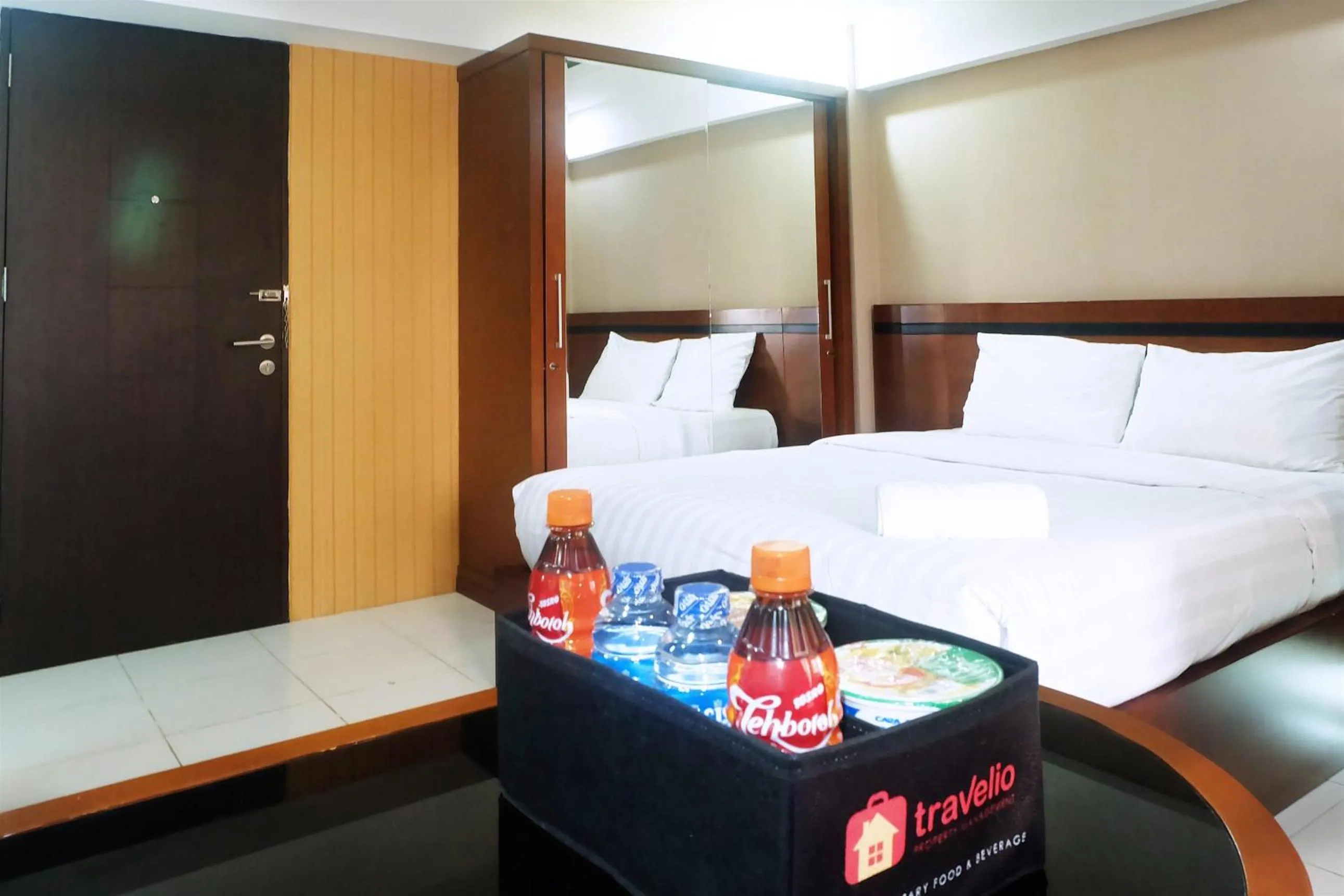 Bed in Kebagusan City Apartment Simple And Affordable Studio By Travelio