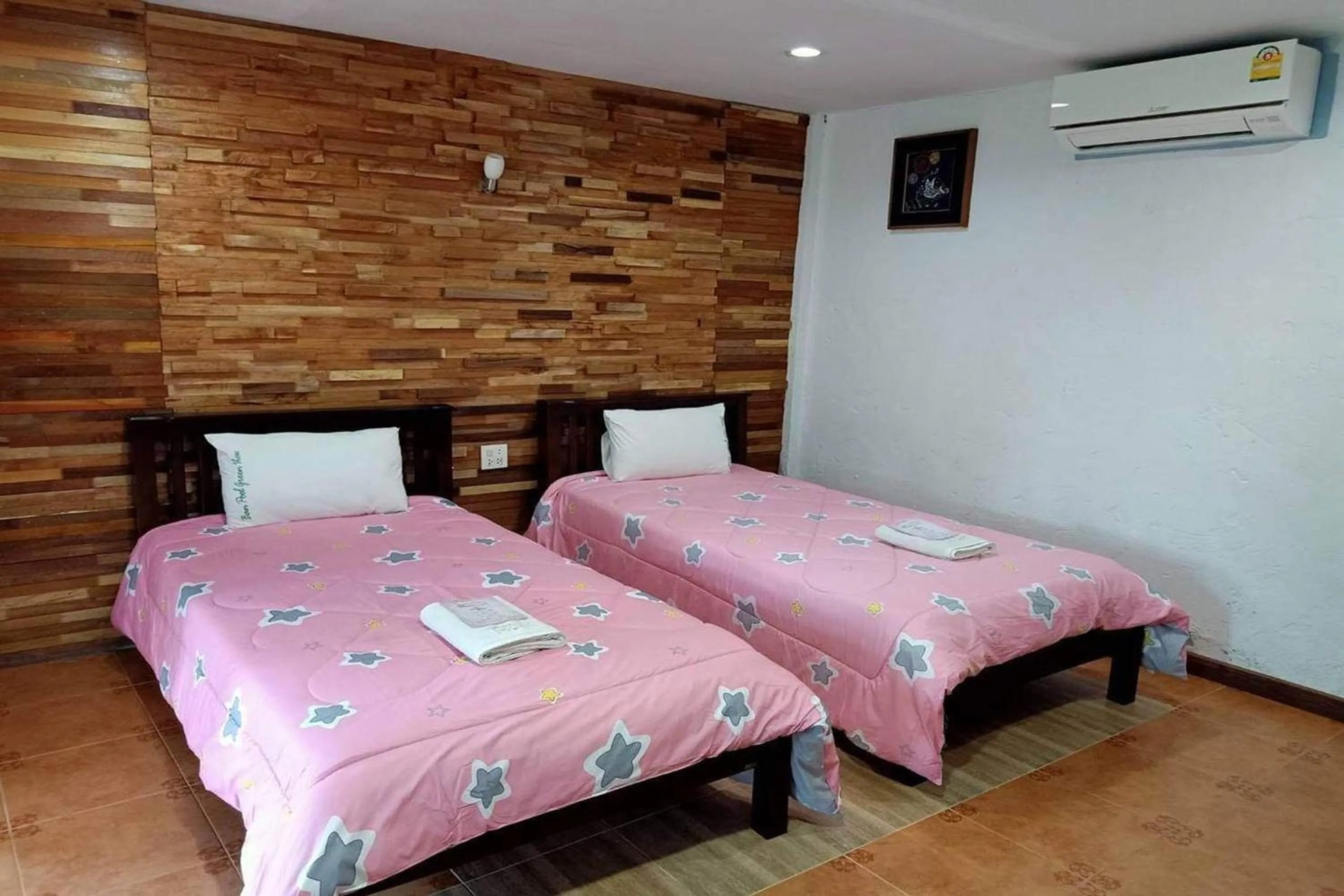 Bed in Ozone Resort & Pool Villa