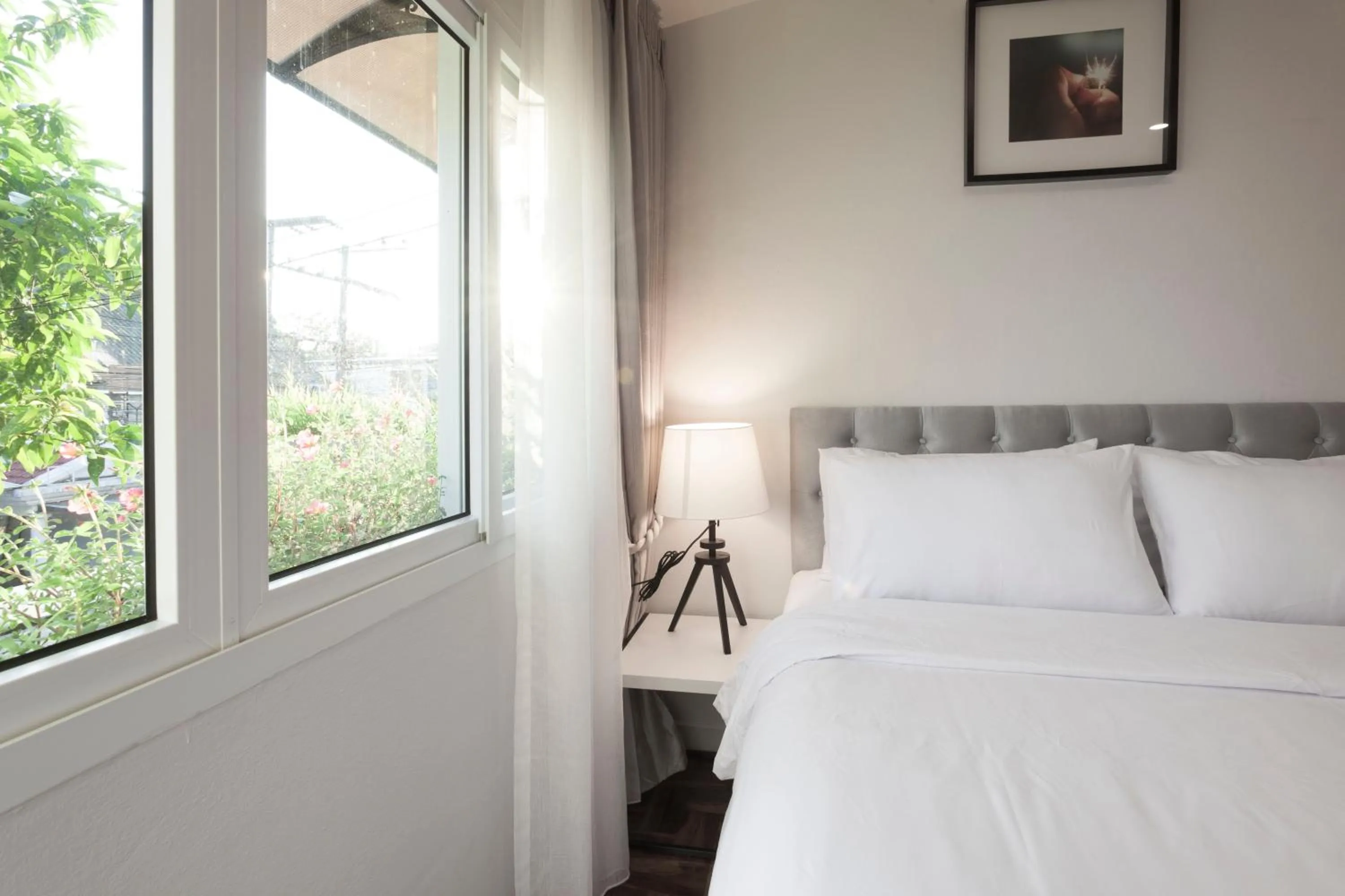 Photo of the whole room, Bed in Cozy Home by Nan