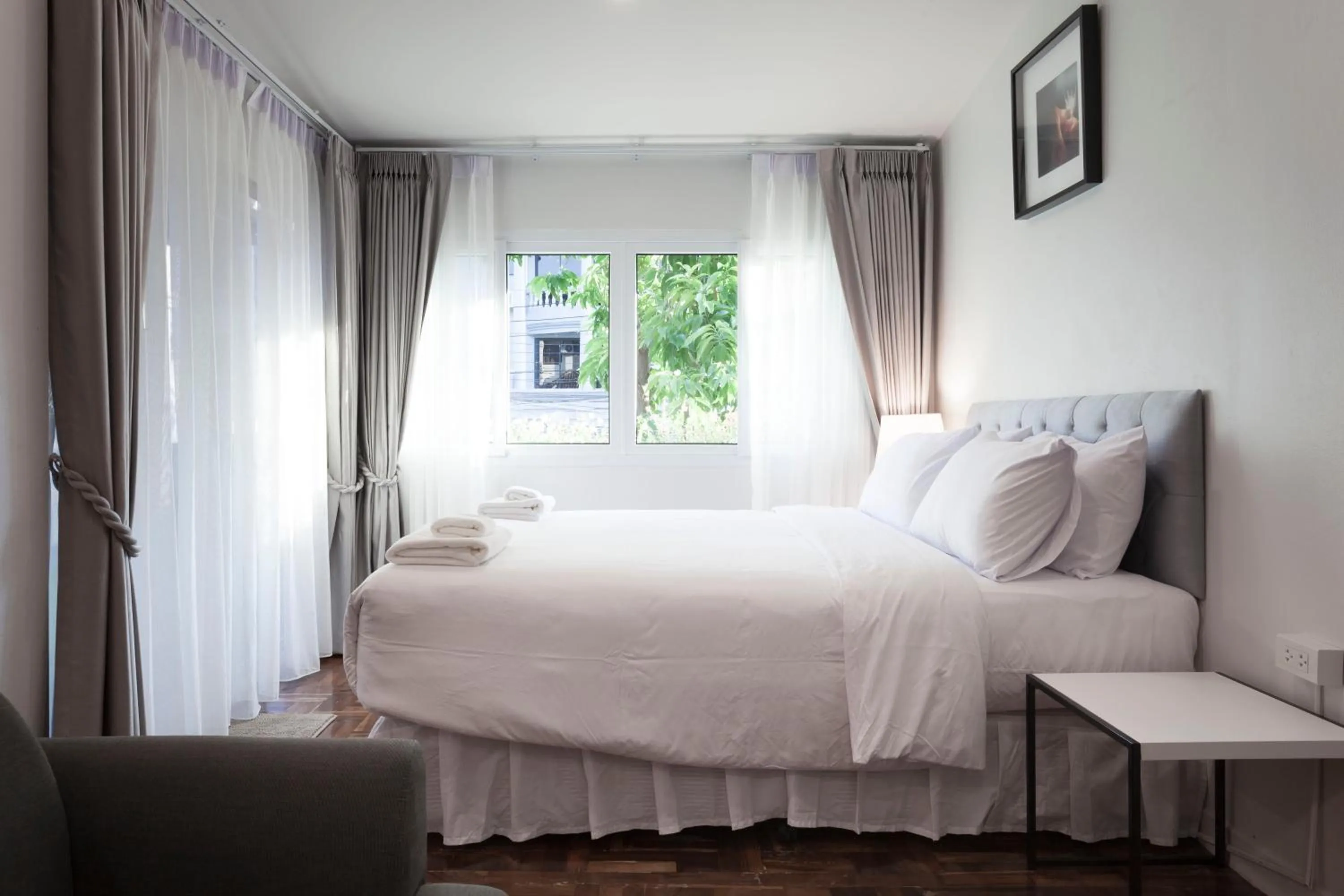 Photo of the whole room, Bed in Cozy Home by Nan