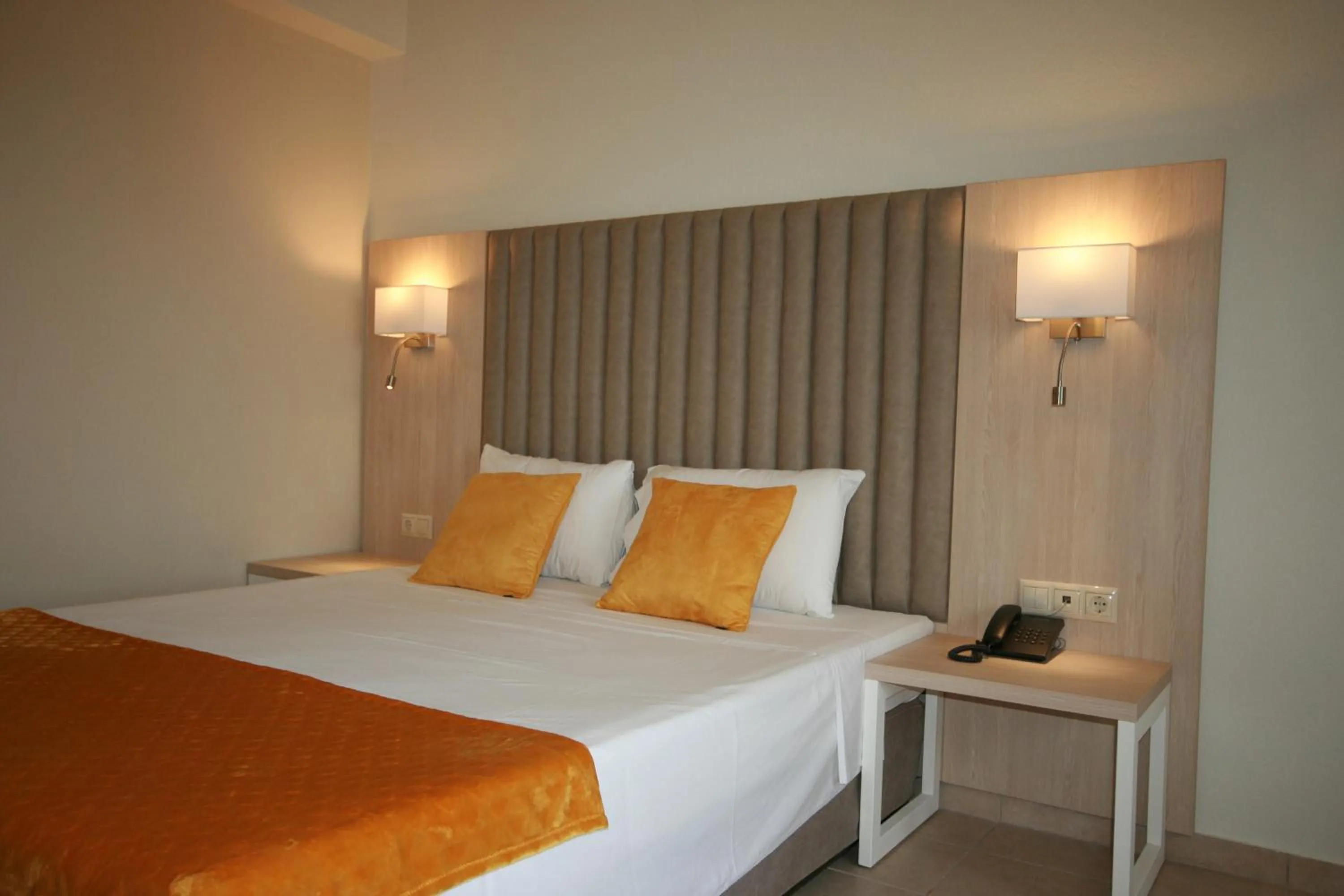 Bed in Aristoteles Holiday Hotel And Spa