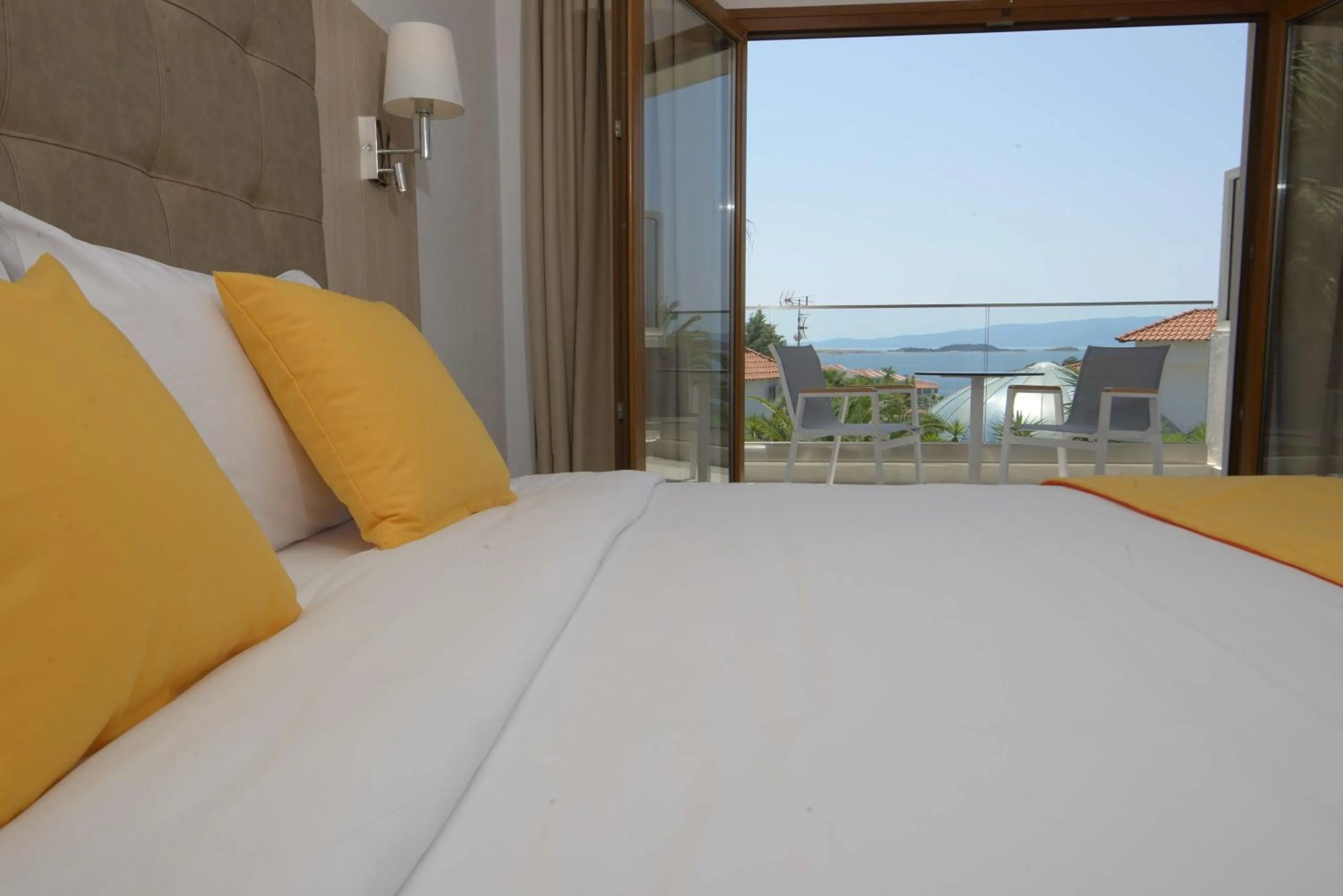 Bed in Aristoteles Holiday Hotel And Spa