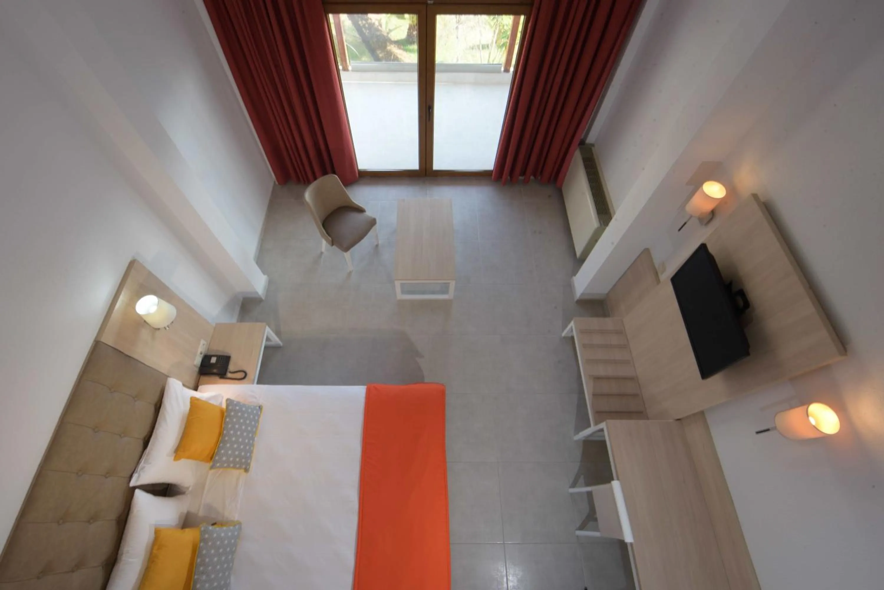 Bedroom in Aristoteles Holiday Hotel And Spa