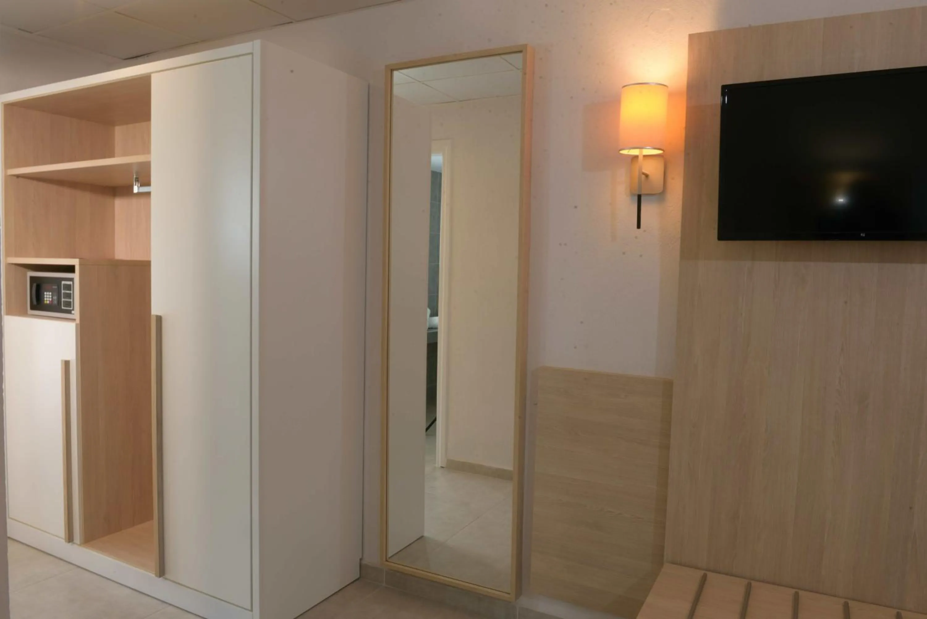 wardrobe in Aristoteles Holiday Hotel And Spa