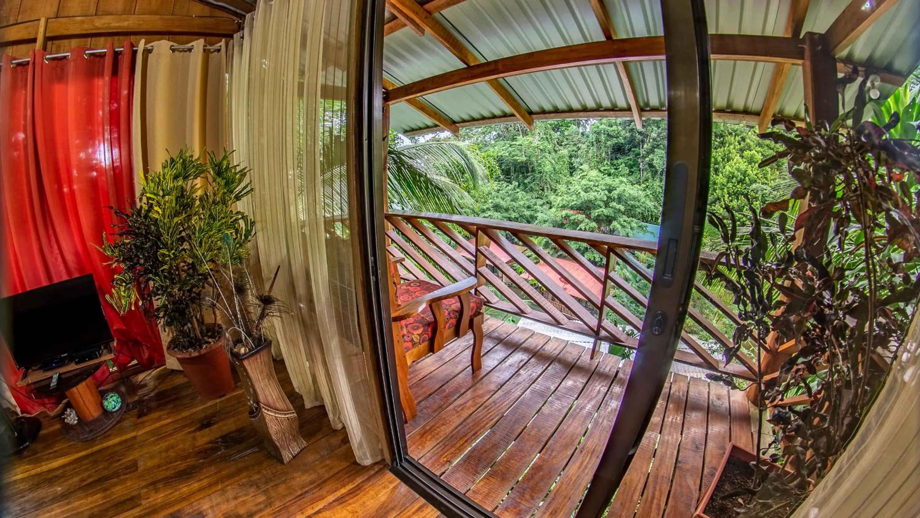 Communal lounge/ TV room in Cabañas del Lago