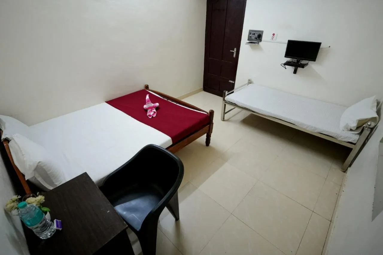 Bed in Athirappilly Ambady Resort