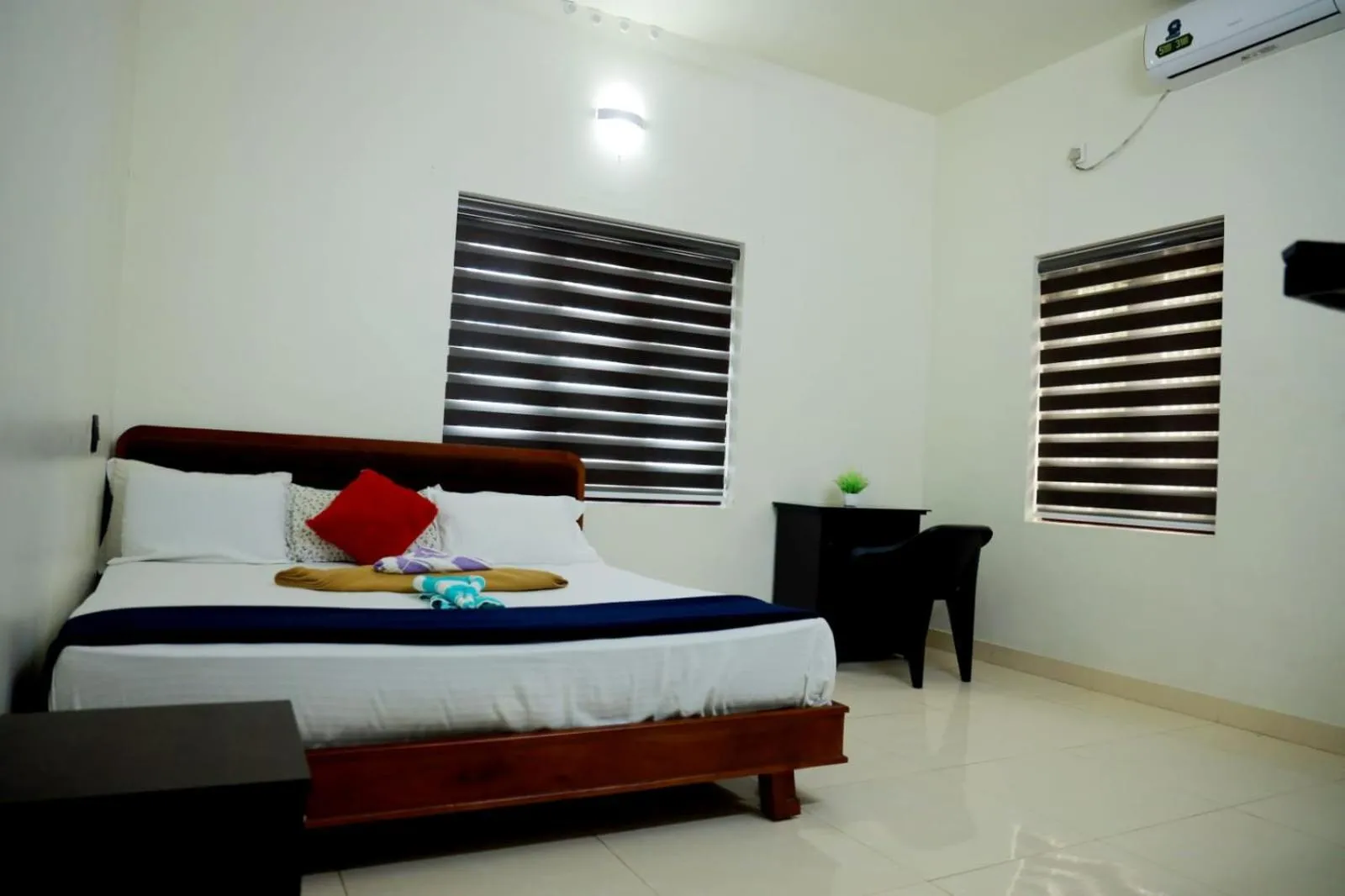 Bed in Athirappilly Ambady Resort