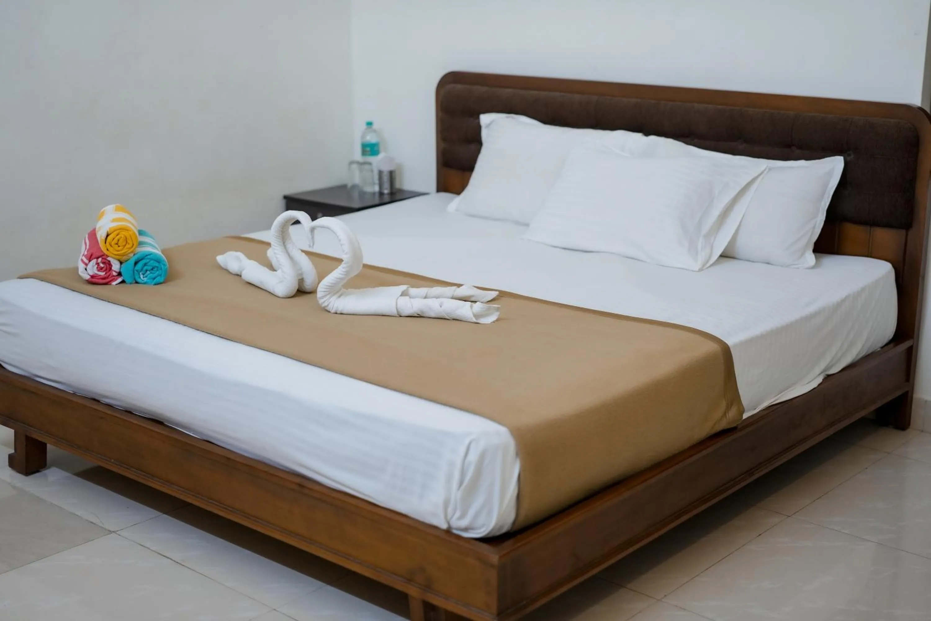 Bed in Athirappilly Ambady Resort