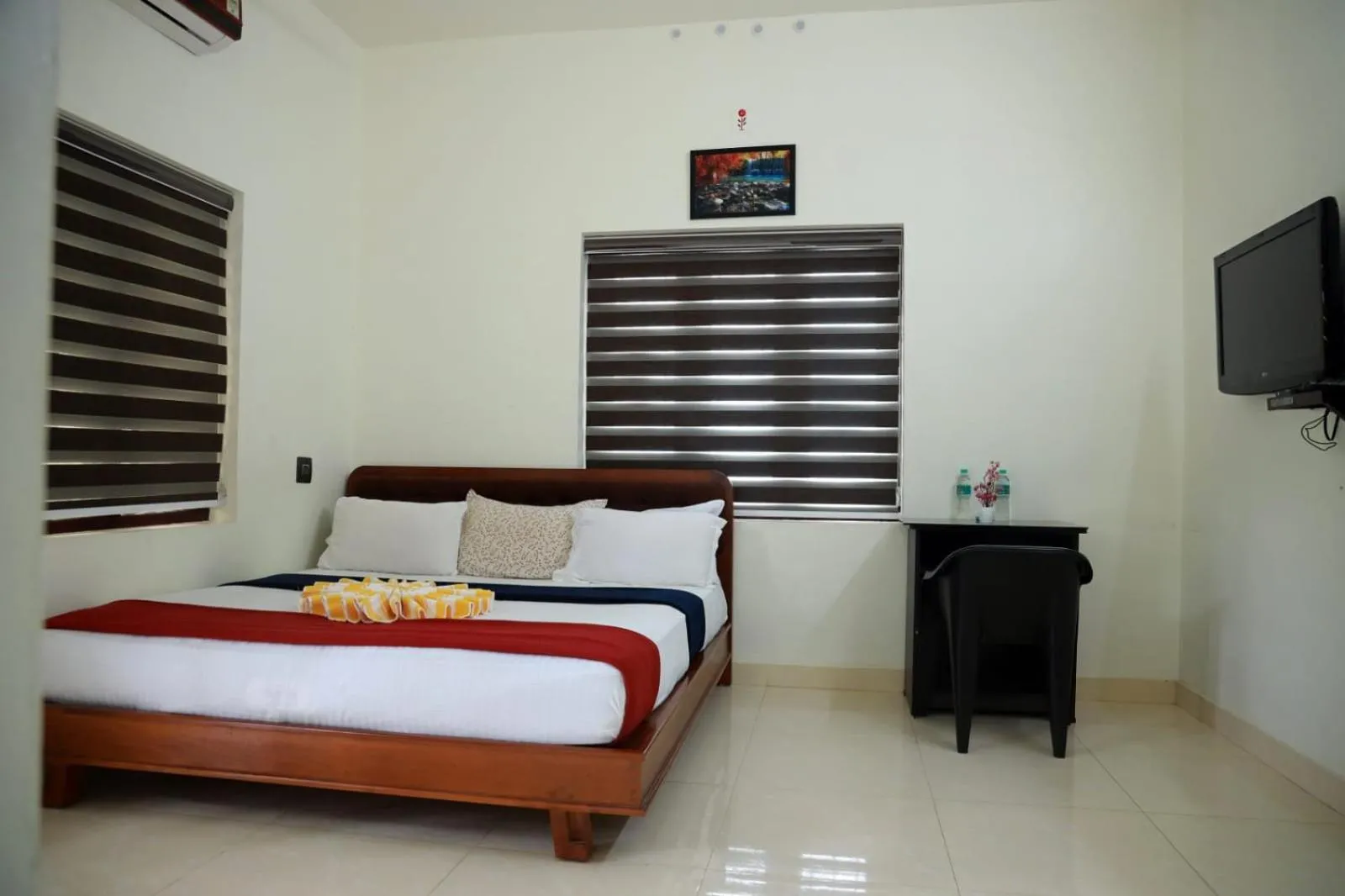 Bed in Athirappilly Ambady Resort