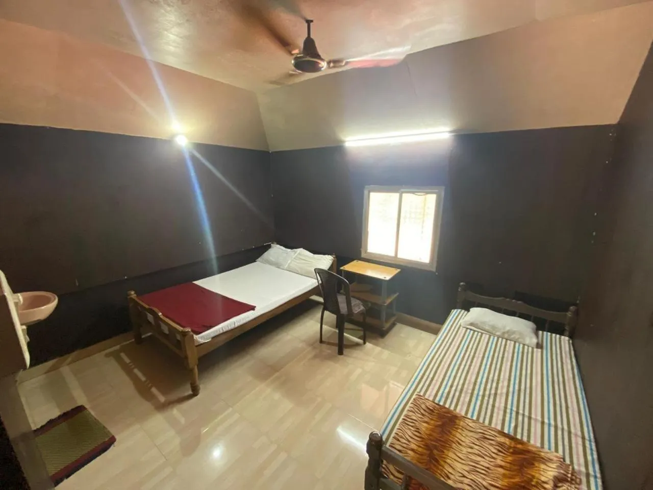 Bed in Athirappilly Ambady Resort