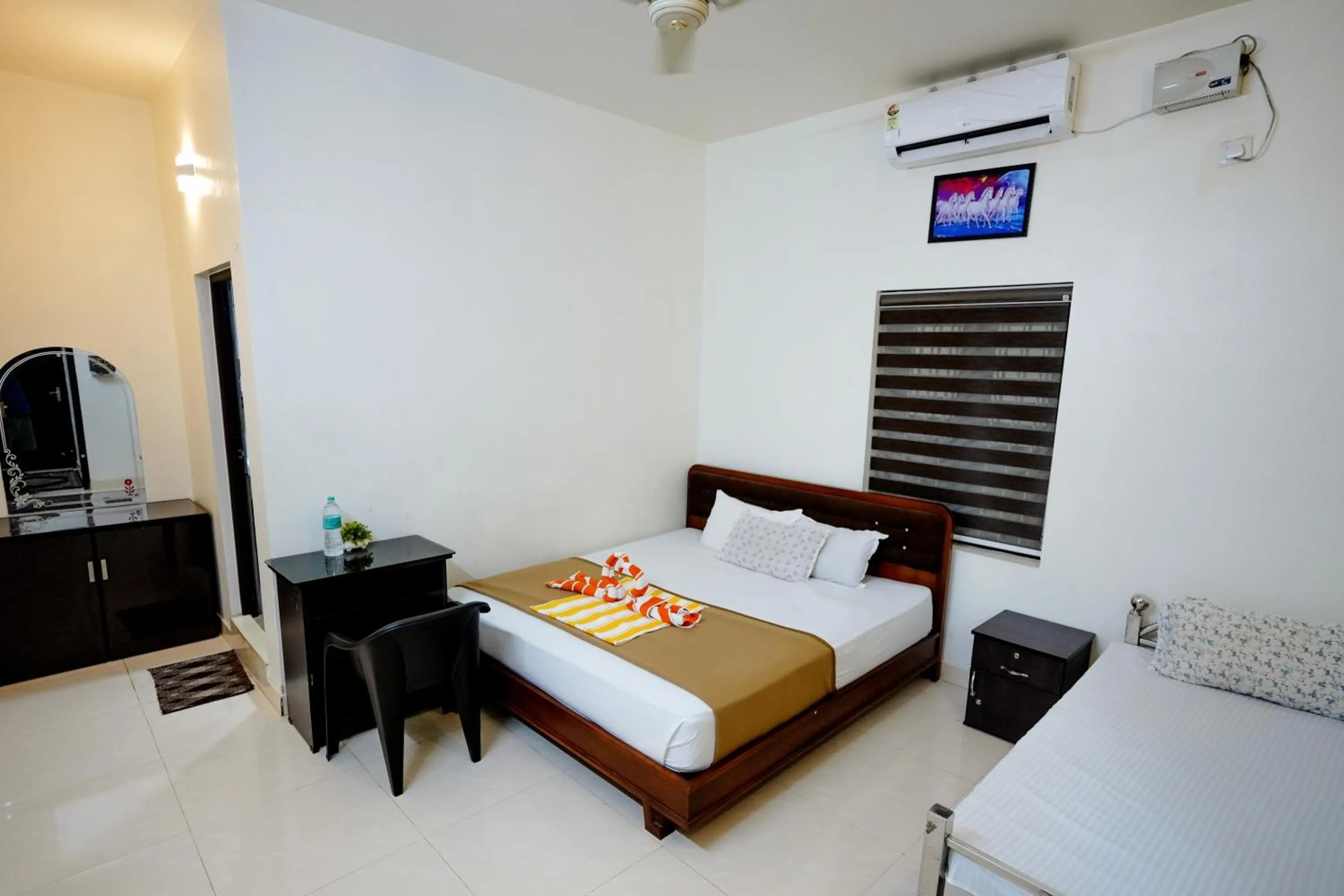 Bed in Athirappilly Ambady Resort