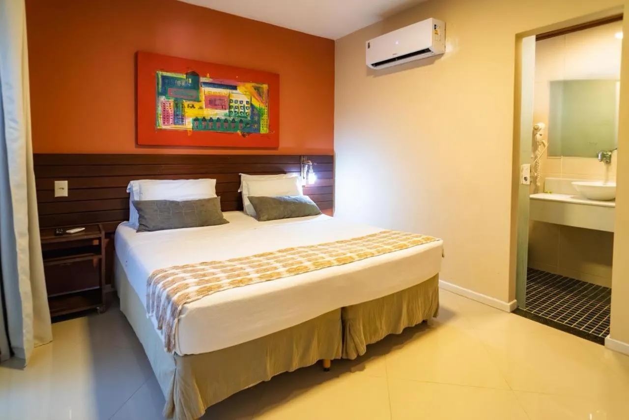 Bed in Pousada Mareia