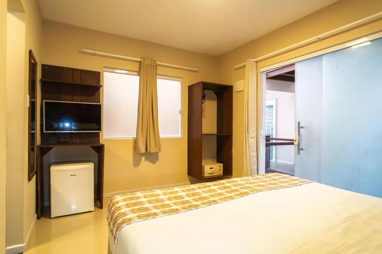 Bed in Pousada Mareia