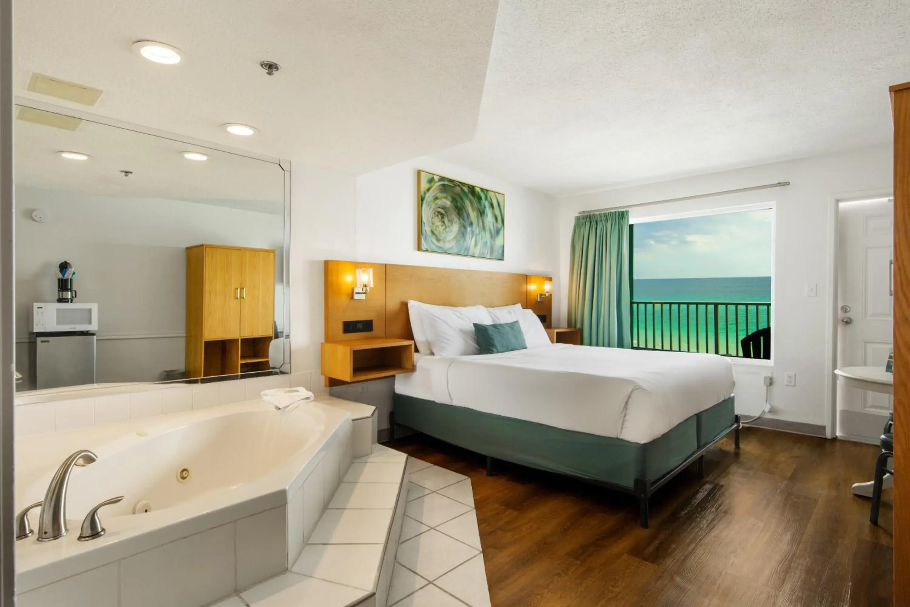 Bed in Beachcomber Beachfront Hotel, a By The Sea Resort Bed in Beachcomber Beachfront Hotel, a By The Sea Resort